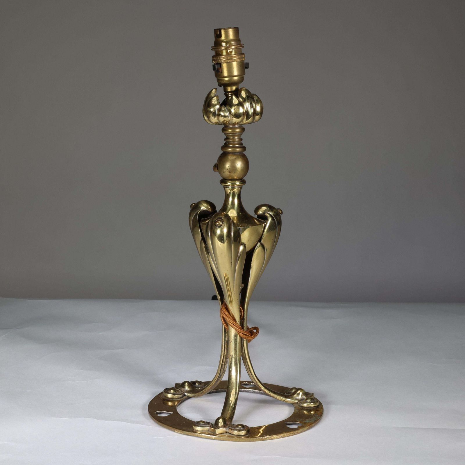 An Arts & Crafts Brass Table Lamp Tulip Shaped With Heart Cut Outs To The Base photo 1224.0