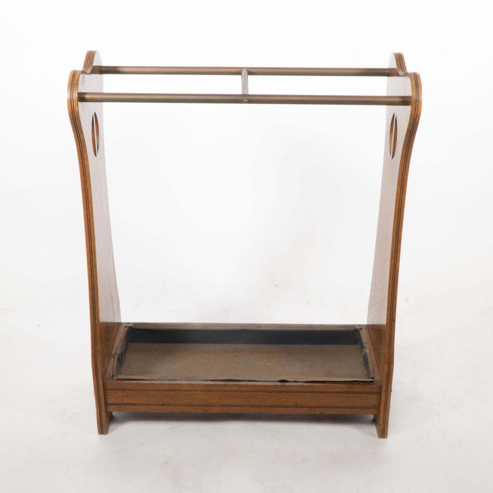 An Arts And Crafts Oak Umbrella And Walking Stick Stand photo furniture