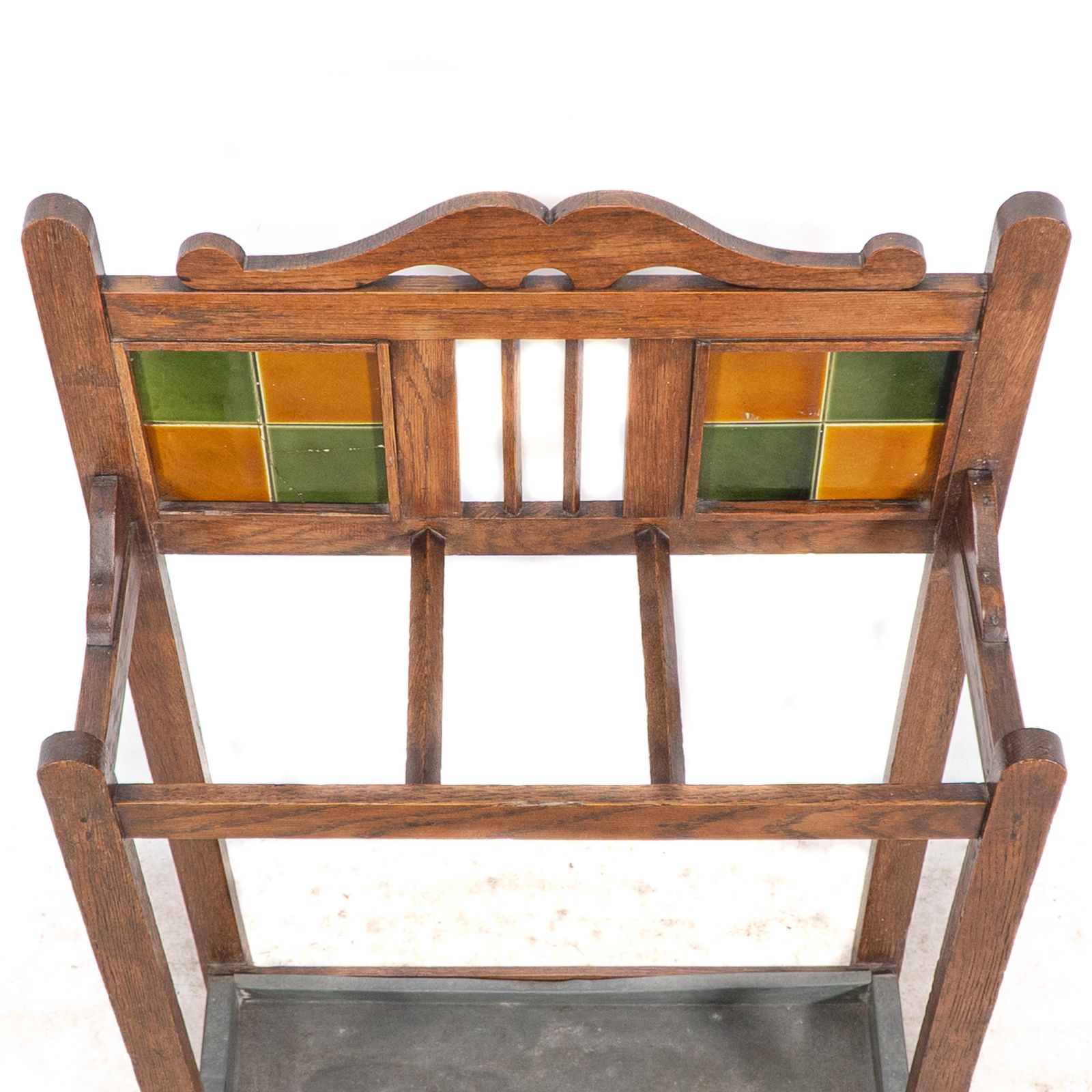 photo furniture An Arts & Crafts Oak Umbrella & Stick Stand With Original Green & Mustard Tiles
