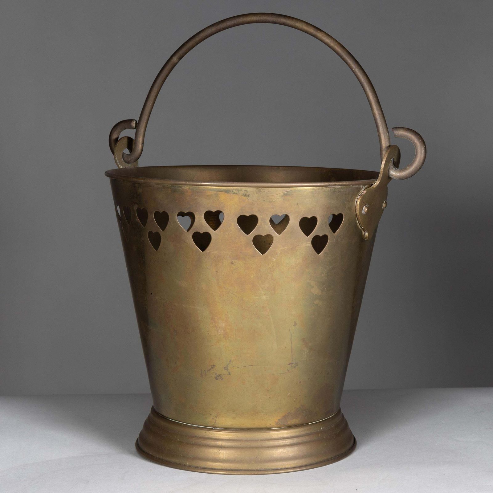 An Arts & Crafts Brass Champagne Bucket With Pierced Voysey Style Heart Decor photo furniture