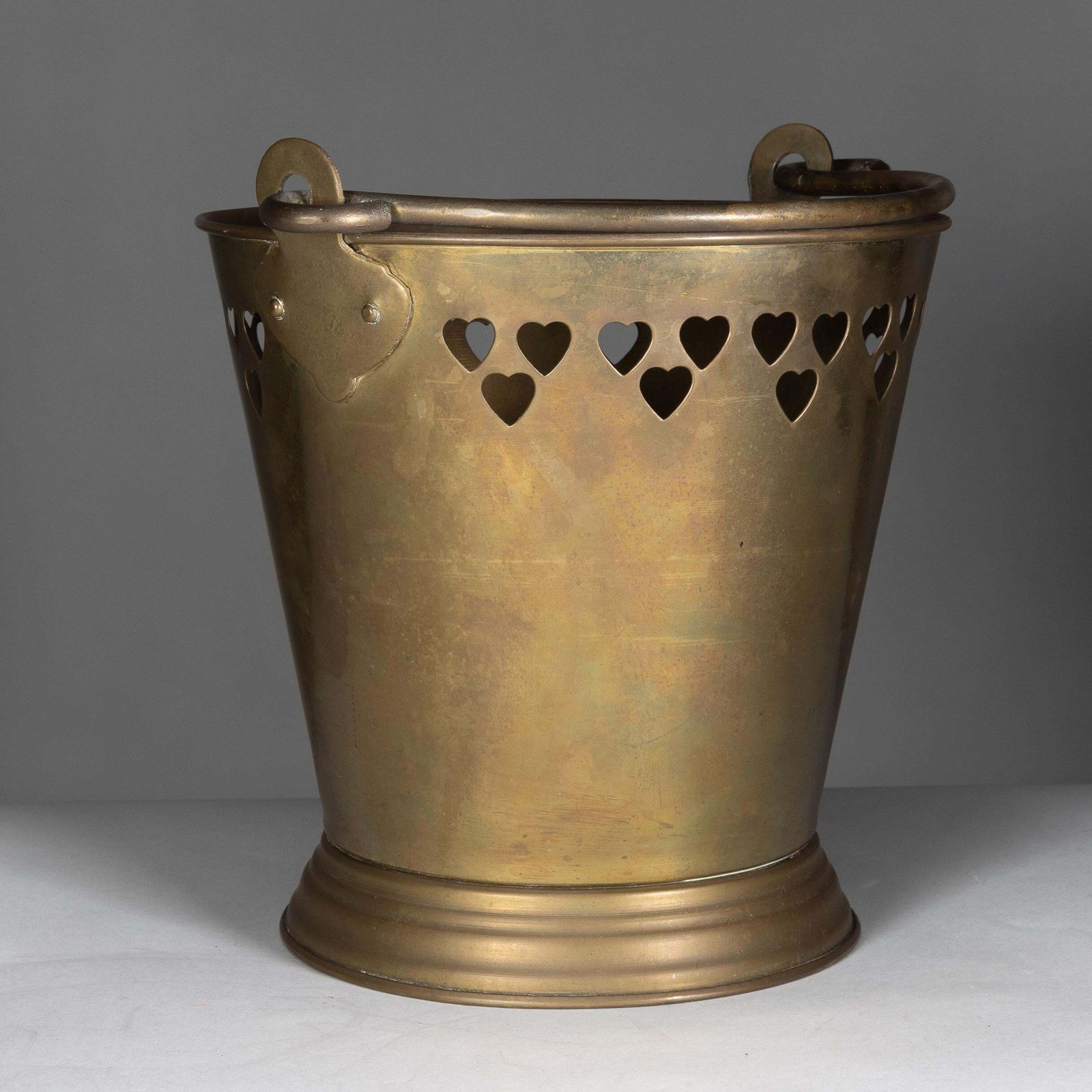 An Arts & Crafts Brass Champagne Bucket With Pierced Voysey Style Heart Decor photo vinterior