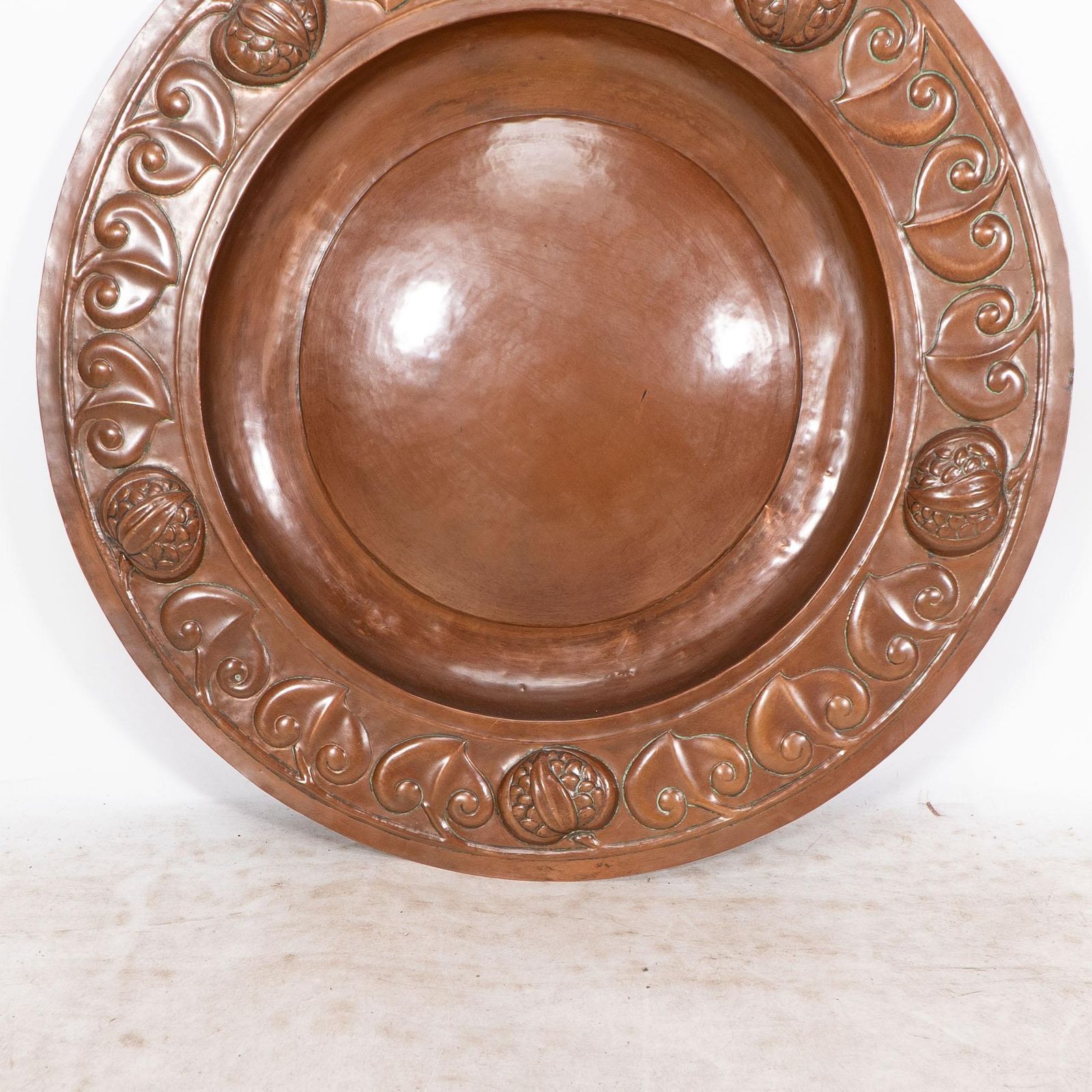 A Large Arts And Crafts Hand Formed Copper Charger With Stylized Decoration photo vintage