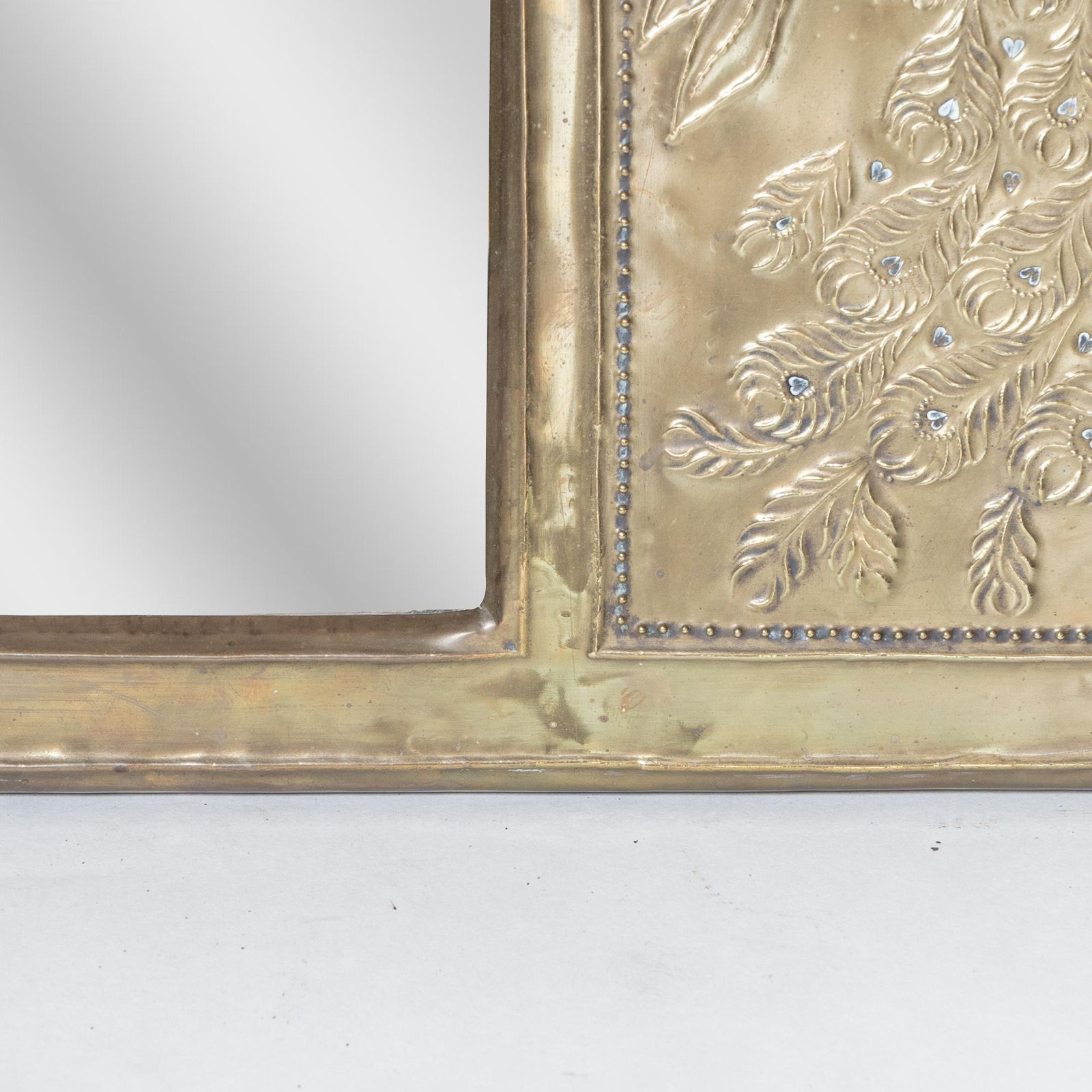 2500.0 An Aesthetic Movement Brass Mirror With Stylized Peacocks Perched On A Branch photo