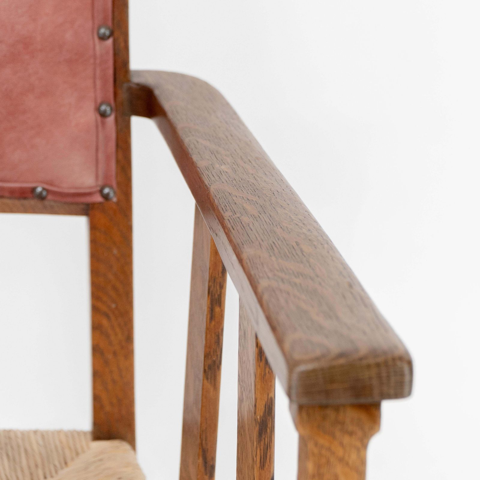 photo for sale Liberty & Co. An Arts & Crafts Rush Seat Armchair With A Shaped Back