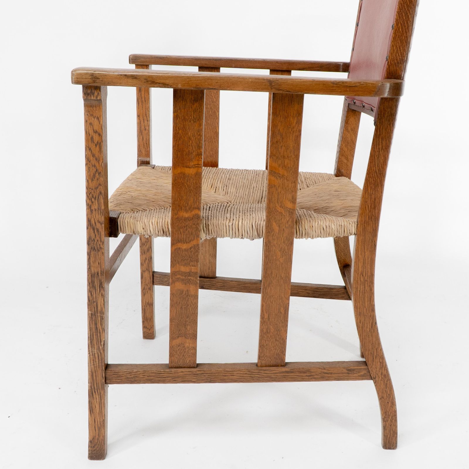 photo vintage Liberty & Co. An Arts & Crafts Rush Seat Armchair With A Shaped Back