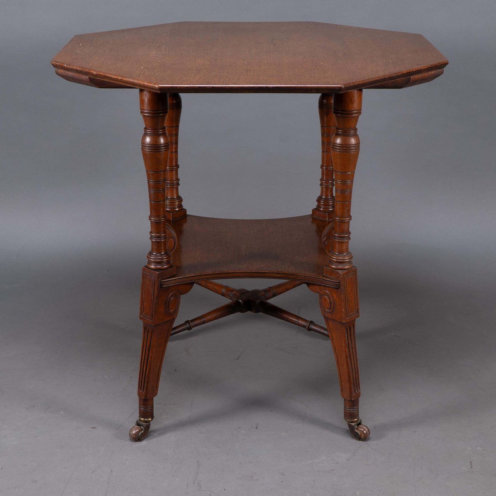 Jas Shoolbred. An Aesthetic Movement Walnut Octagonal Center Table photo furniture