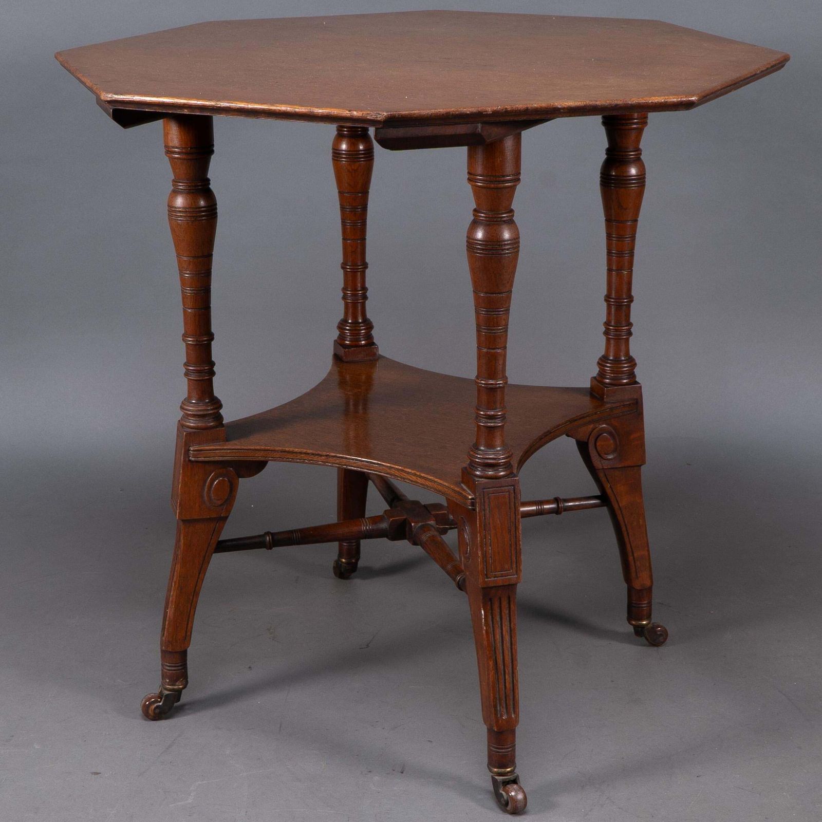 photo for sale Jas Shoolbred. An Aesthetic Movement Walnut Octagonal Center Table