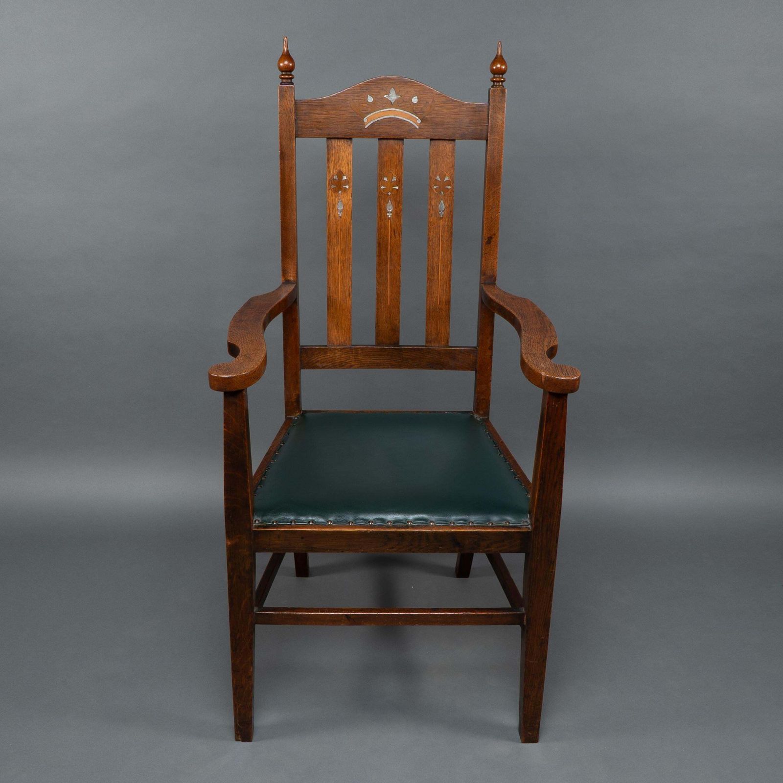 Liberty & Co Attributed. An Arts & Crafts Oak Armchair With Inlaid Royal Crown photo furniture