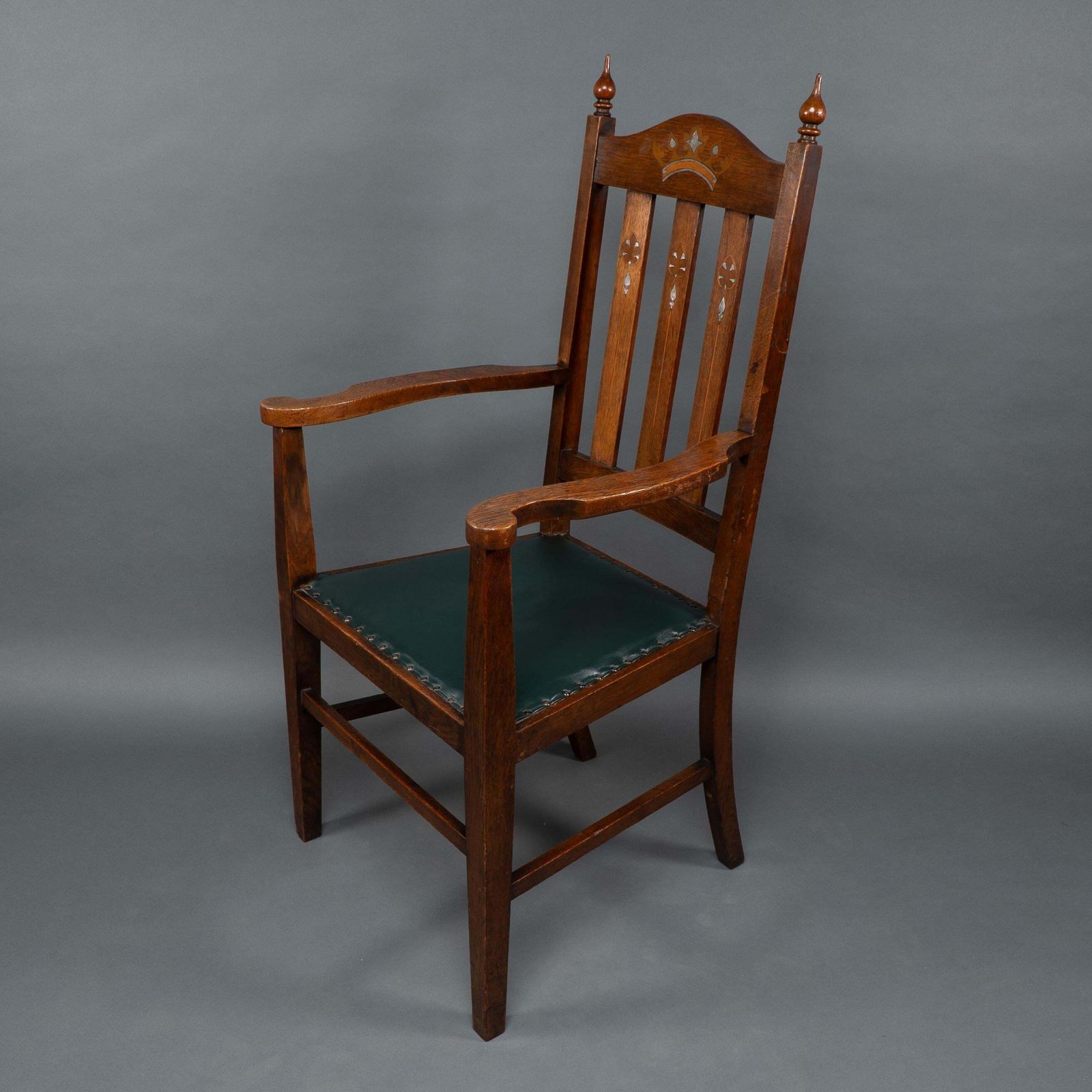 Liberty & Co Attributed. An Arts & Crafts Oak Armchair With Inlaid Royal Crown photo for sale