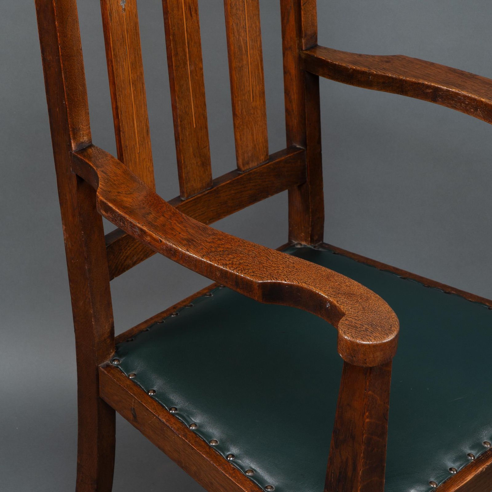 photo for sale Liberty & Co Attributed. An Arts & Crafts Oak Armchair With Inlaid Royal Crown