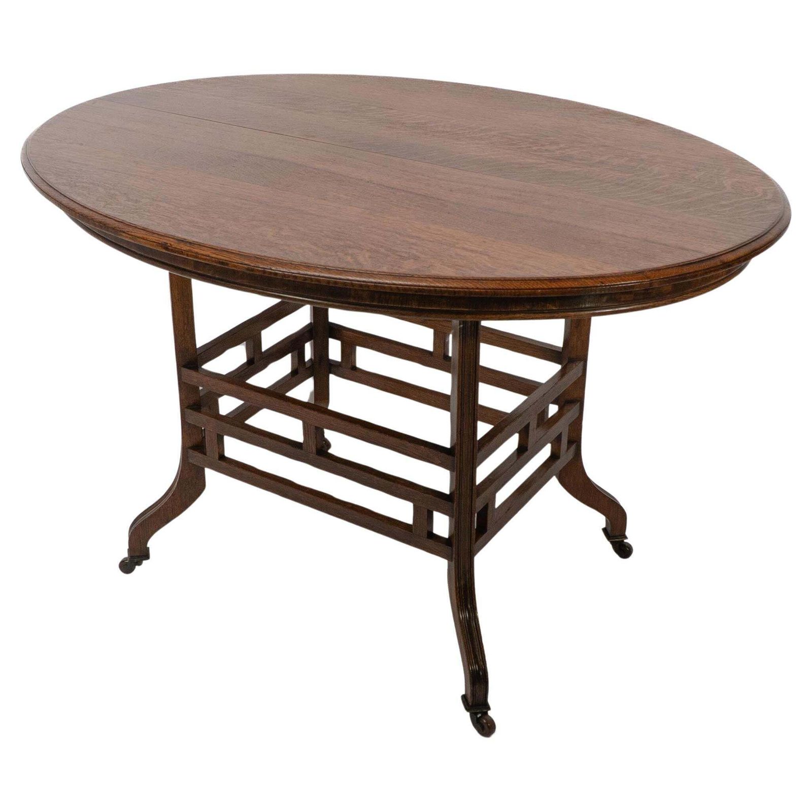 Lambs Of Manchester, Stamped Lambs. A Rare Anglo Japanese Oak Oval Centre Table