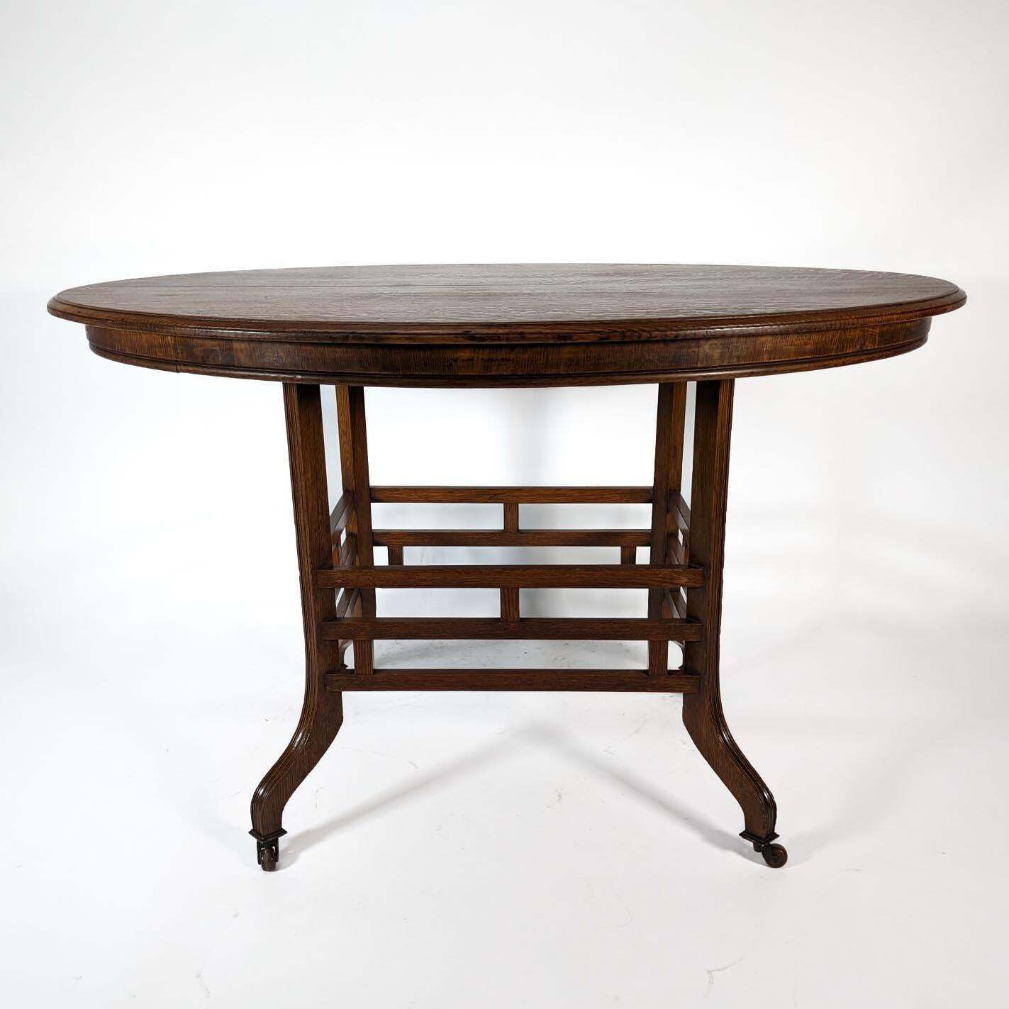 Lambs Of Manchester, Stamped Lambs. A Rare Anglo Japanese Oak Oval Centre Table photo buy