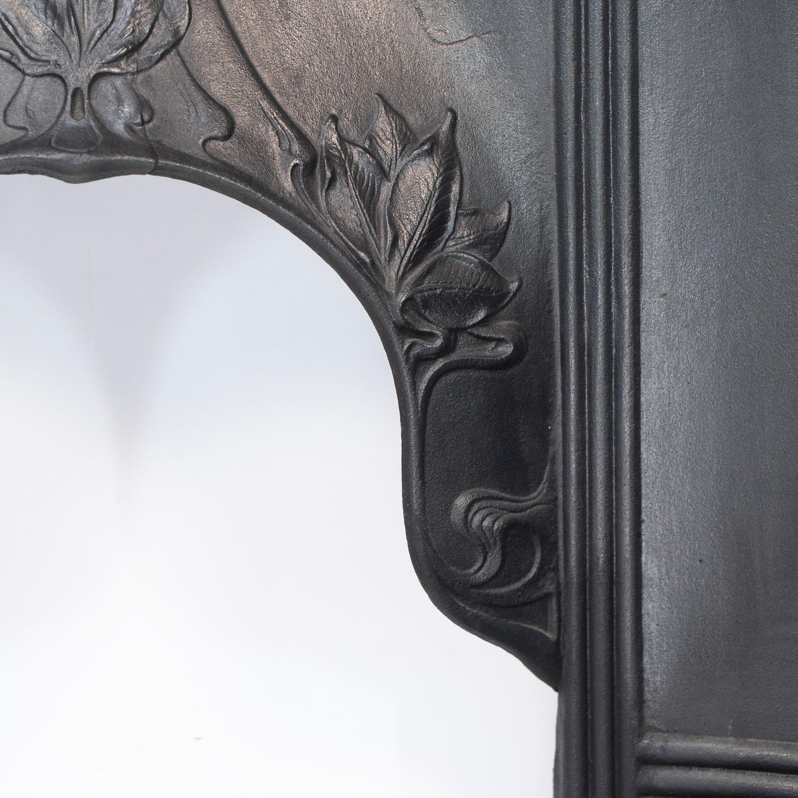 Home Fixtures Arts & Crafts Cast Iron Fireplace With Curved Sides & Stylized Floral Decoration photo