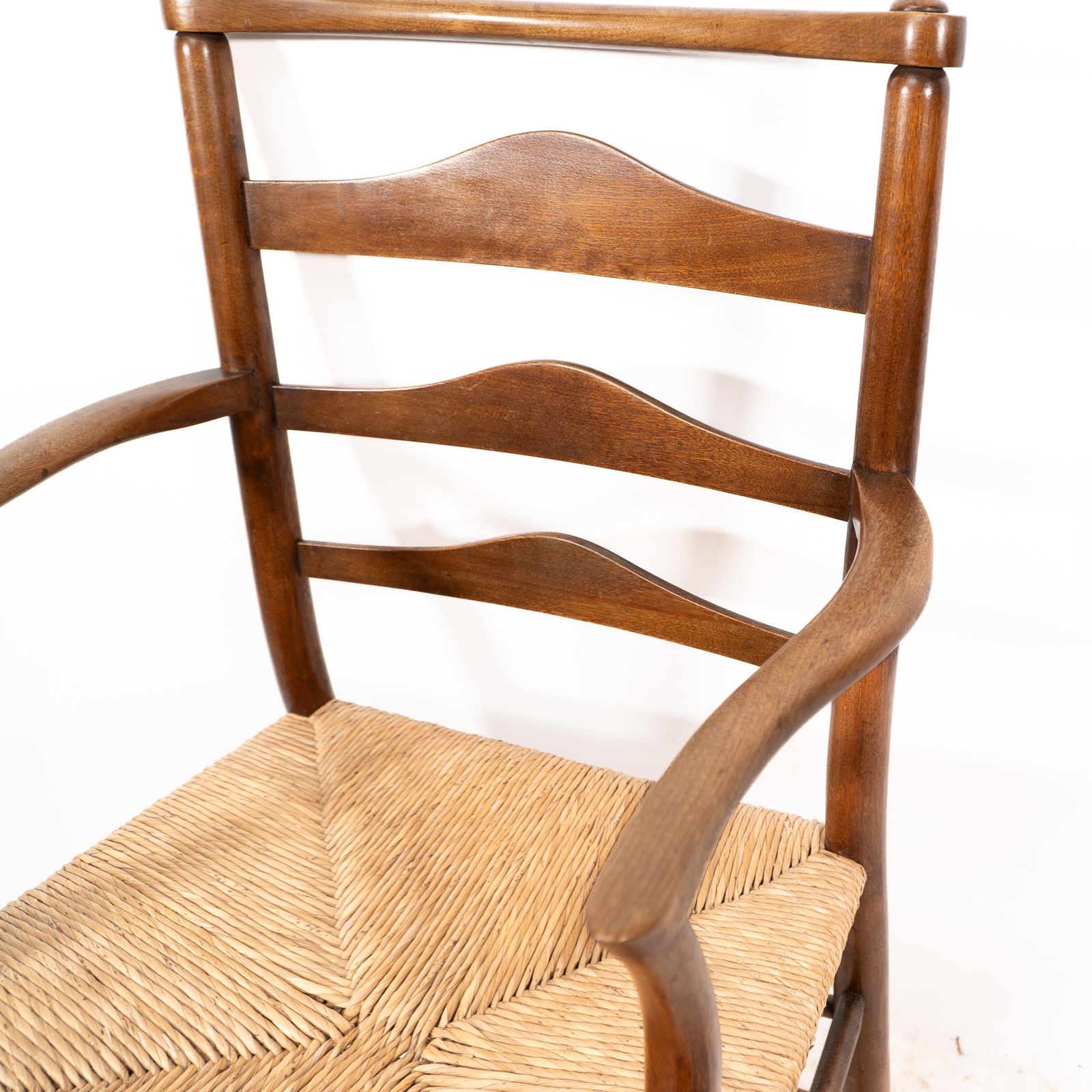 Furniture C R Ashbee. An Arts And Crafts Rush Seat Ladder Back Armchair photo