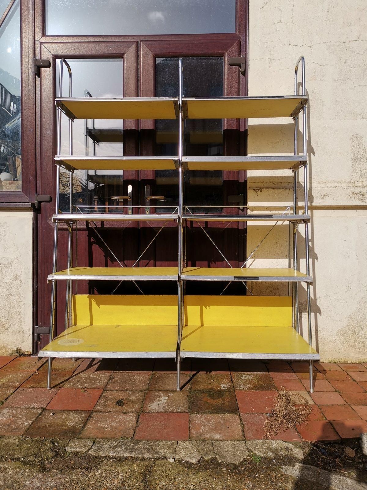 Furniture Stylish Midcentury Chrome On Steel Shop Shelving With Braced Back Supports photo