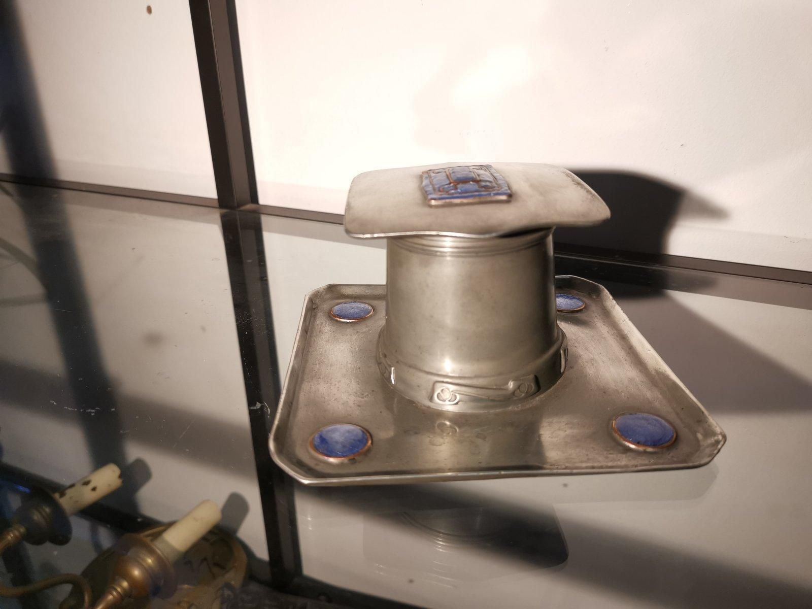Liberty & Co. An Arts & Crafts Pewter Inkwell With Violet Enamel Decoration. photo furniture