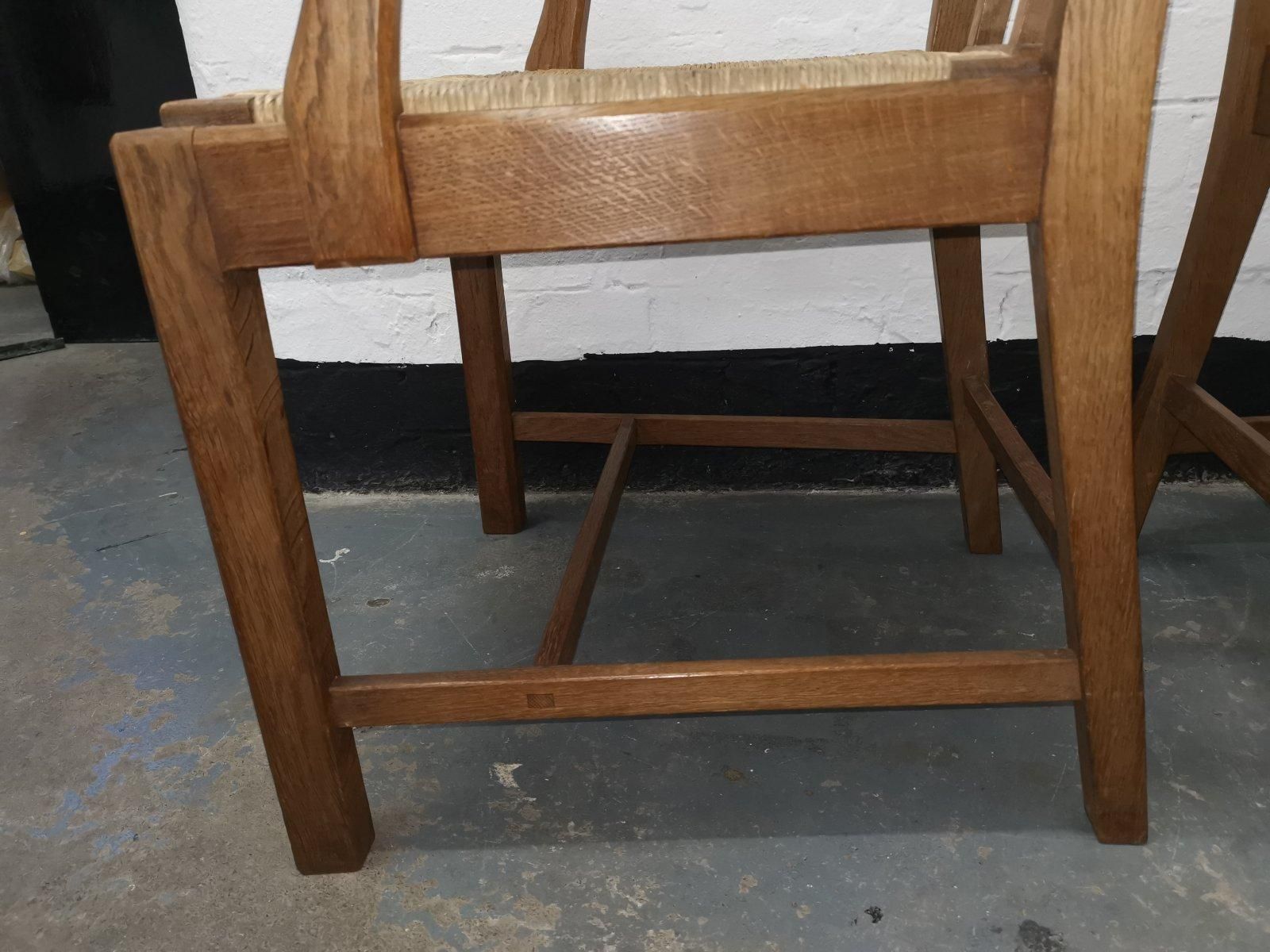 photo vintage Pair Of Cotswold School Arts & Crafts Oak Lattice Back Armchairs With Rush Seats