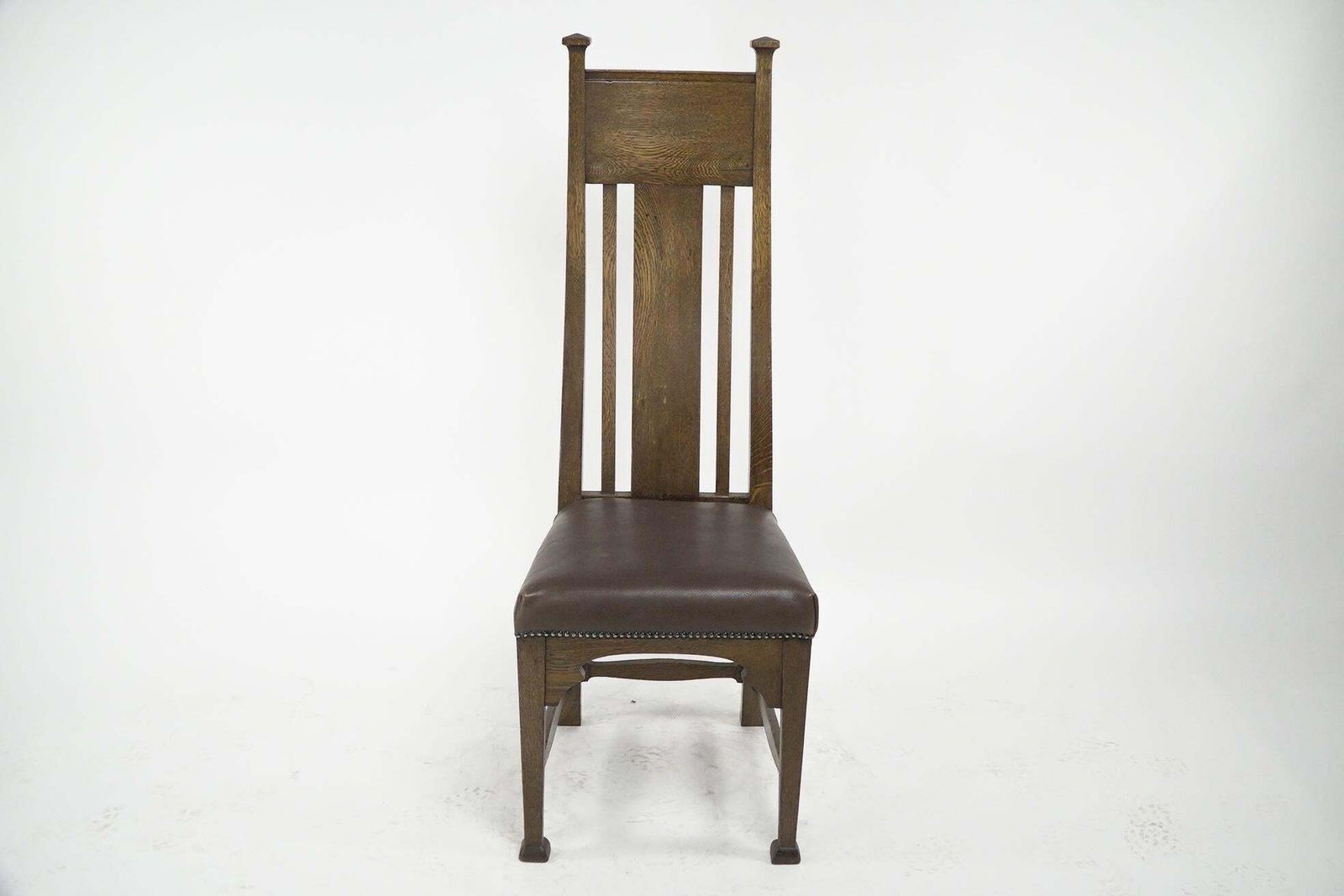 Norman & Stacey Attributed. An Arts And Crafts High With Shaped Back Oak Chair photo furniture