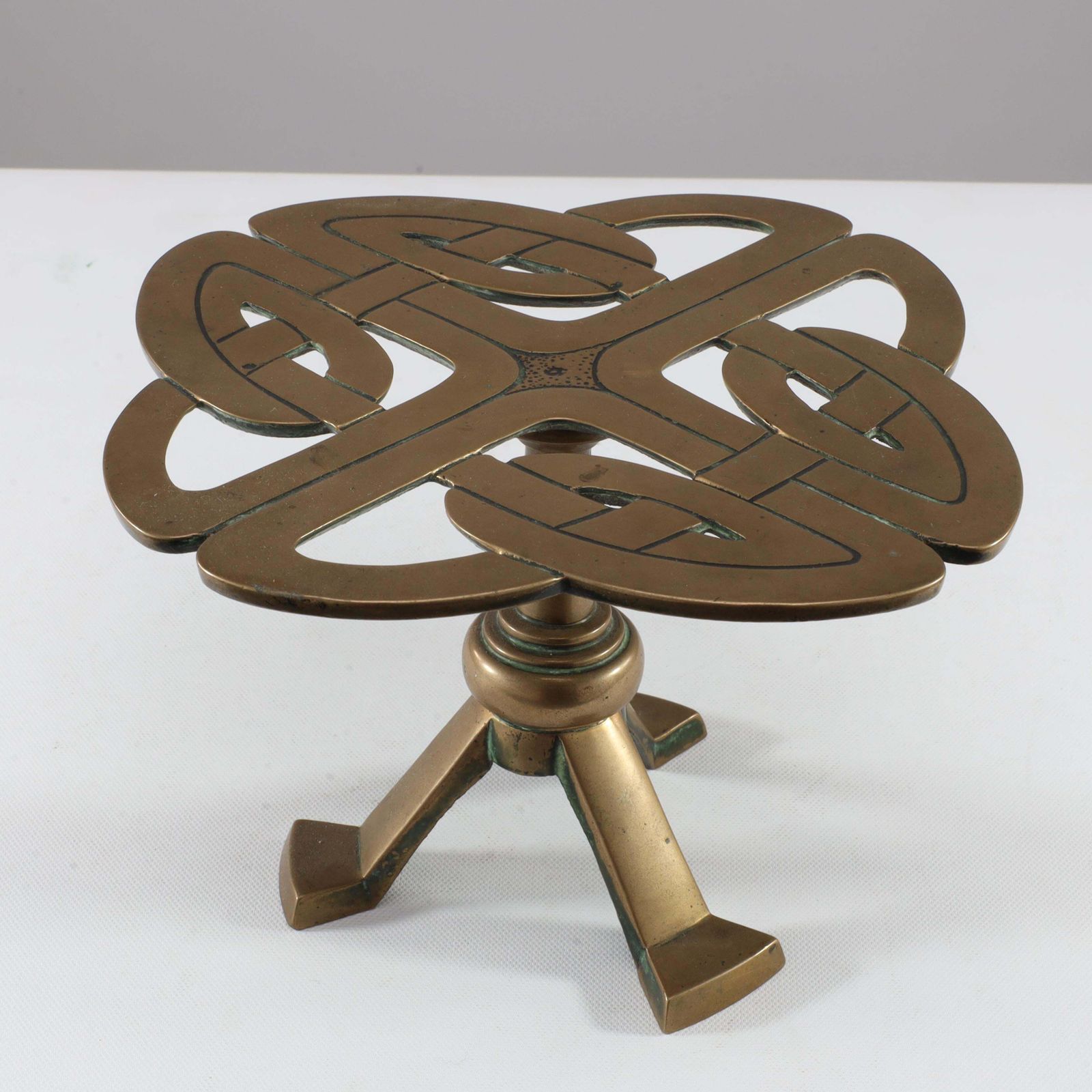 Margaret Gilmour Attri. A Good Glasgow School Brass Trivet With Celtic Details photo furniture