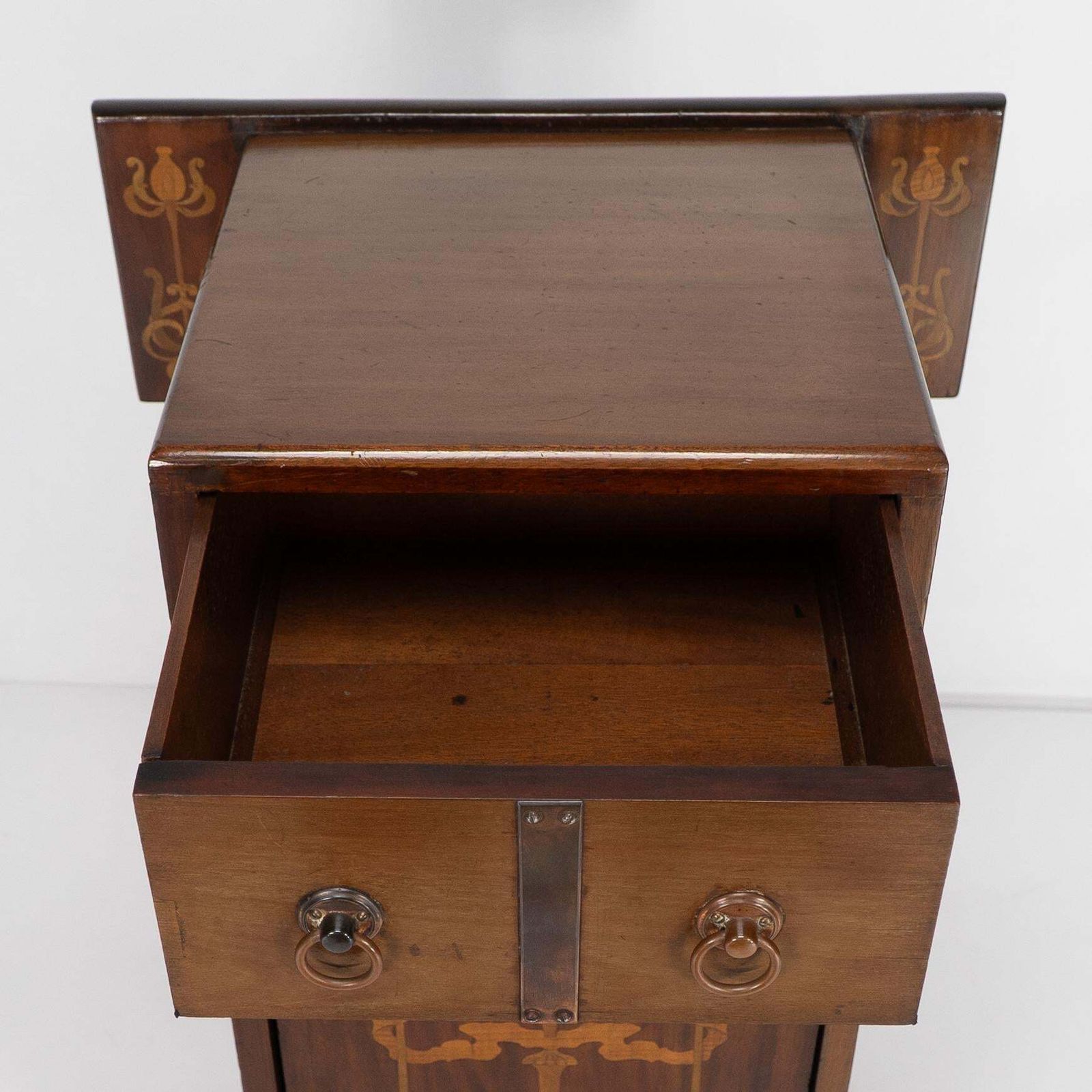 408.0 Liberty & Co Attributed. Arts & Crafts Coal Purdonium With Inlaid Floral Details photo