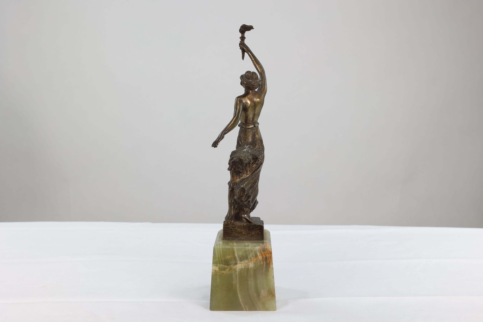 Art B V Fernandez. An Art Deco Bronze Figure On An Onyx Base photo