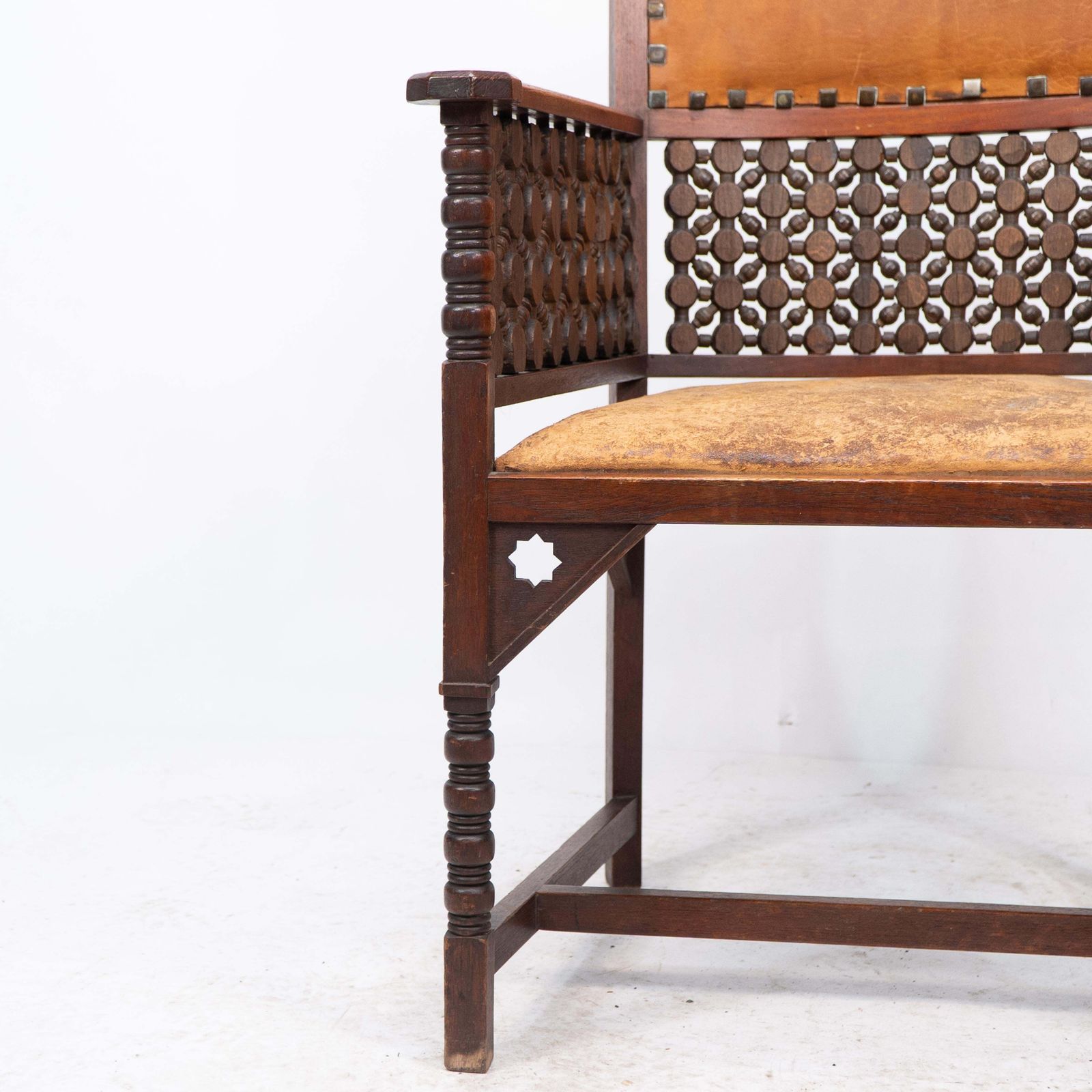 photo vinterior Liberty & Co. A Moorish Arts & Crafts Walnut Armchair With Original Leather Seat