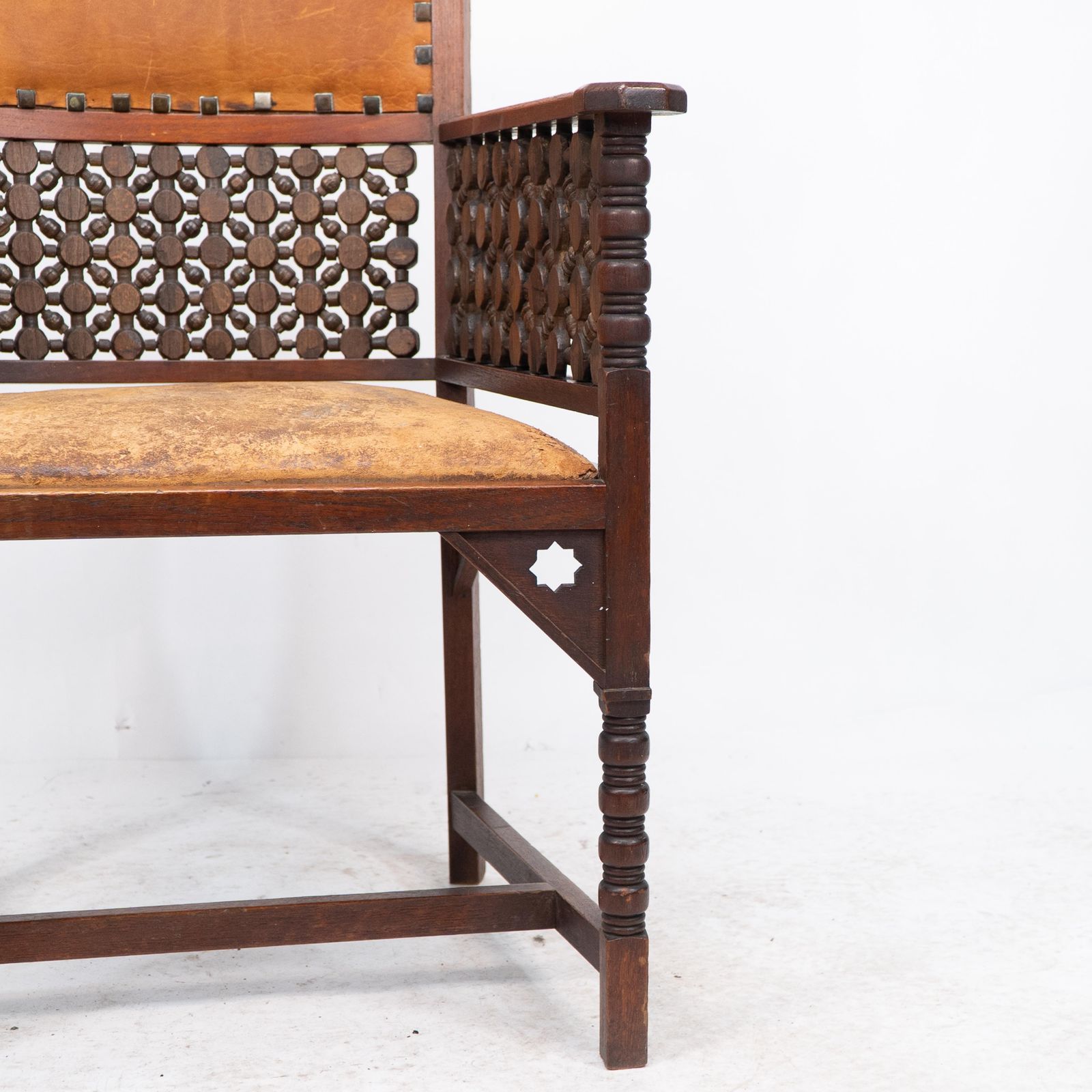 photo buy Liberty & Co. A Moorish Arts & Crafts Walnut Armchair With Original Leather Seat