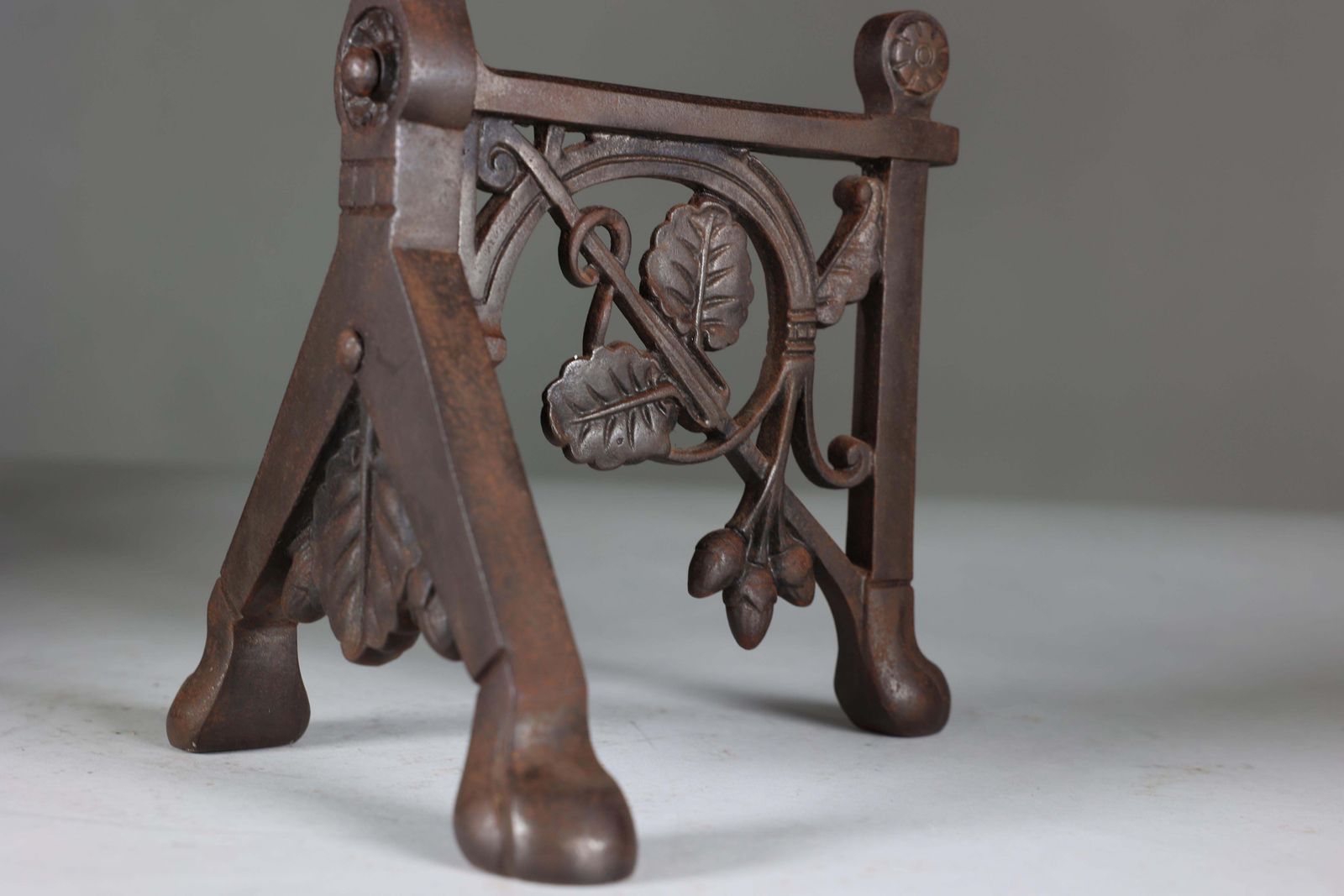photo furniture DR C Dresser (Style Of). A Pair Of Arts And Crafts Cast Iron Fire Dogs