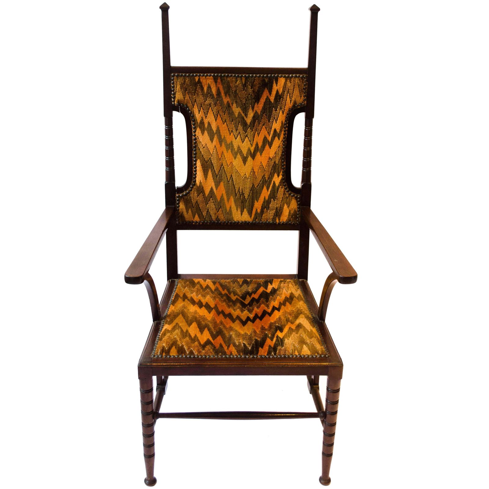 Liberty And Co Attributed. A Late Aesthetic Movement Walnut Armchair.