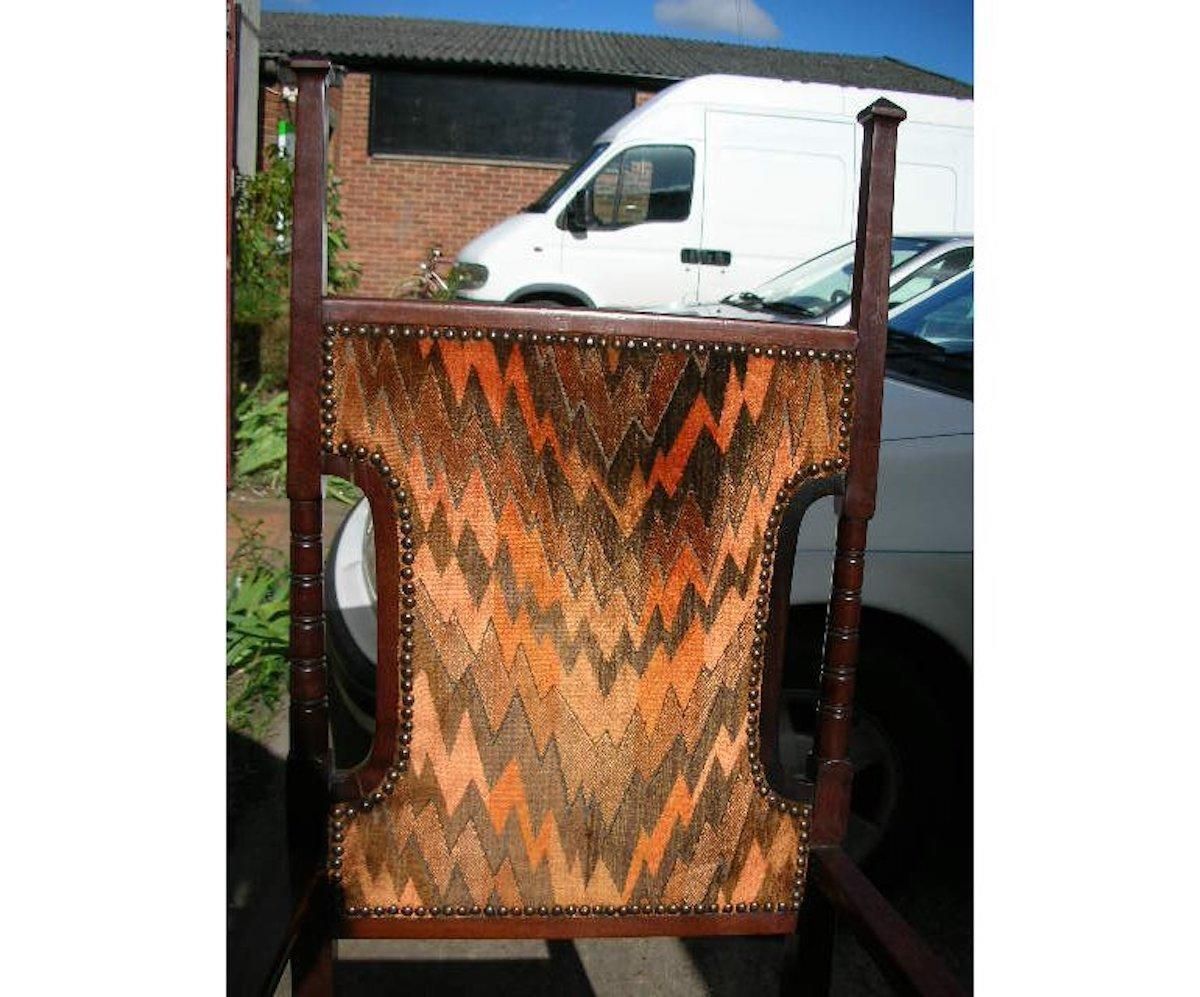 photo furniture Liberty And Co Attributed. A Late Aesthetic Movement Walnut Armchair.