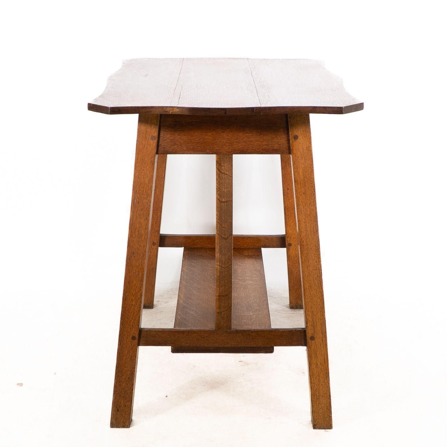 Liberty And Co. A Robust Arts And Crafts Oblong Oak Sidetable photo 1800.0