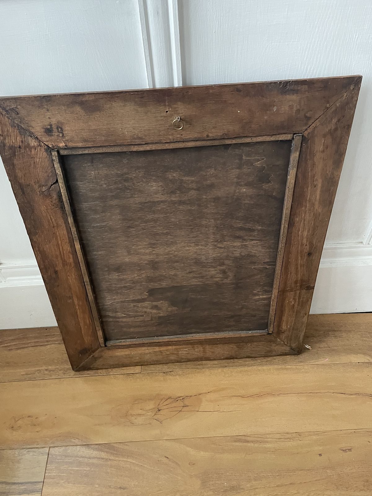 French Carved Cherry Wood Mirror With A Patterned Frame Featuring Beaded And Entwined Ribbon Detail. photo vinterior