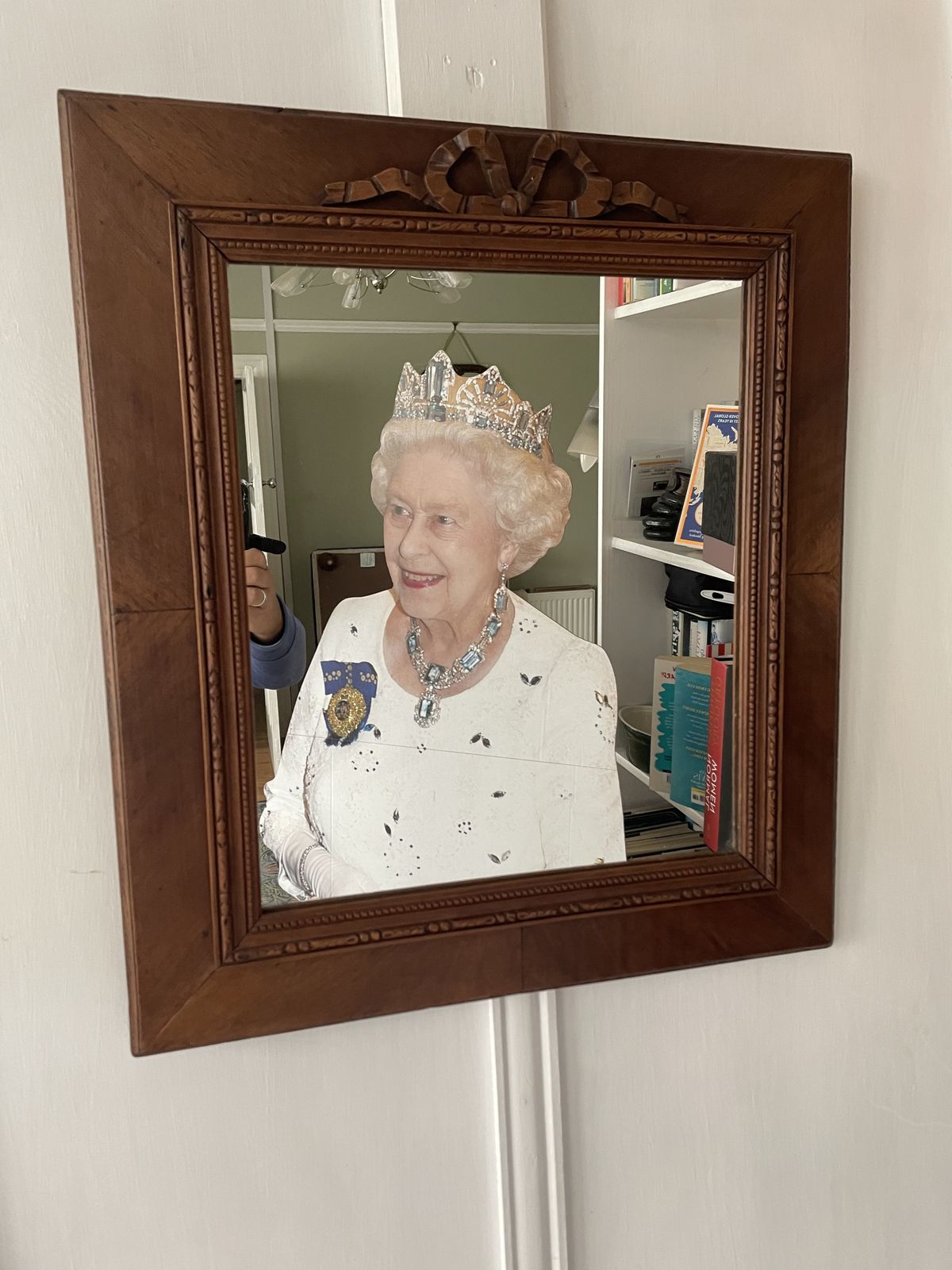 photo furniture French Carved Cherry Wood Mirror With A Patterned Frame Featuring Beaded And Entwined Ribbon Detail.