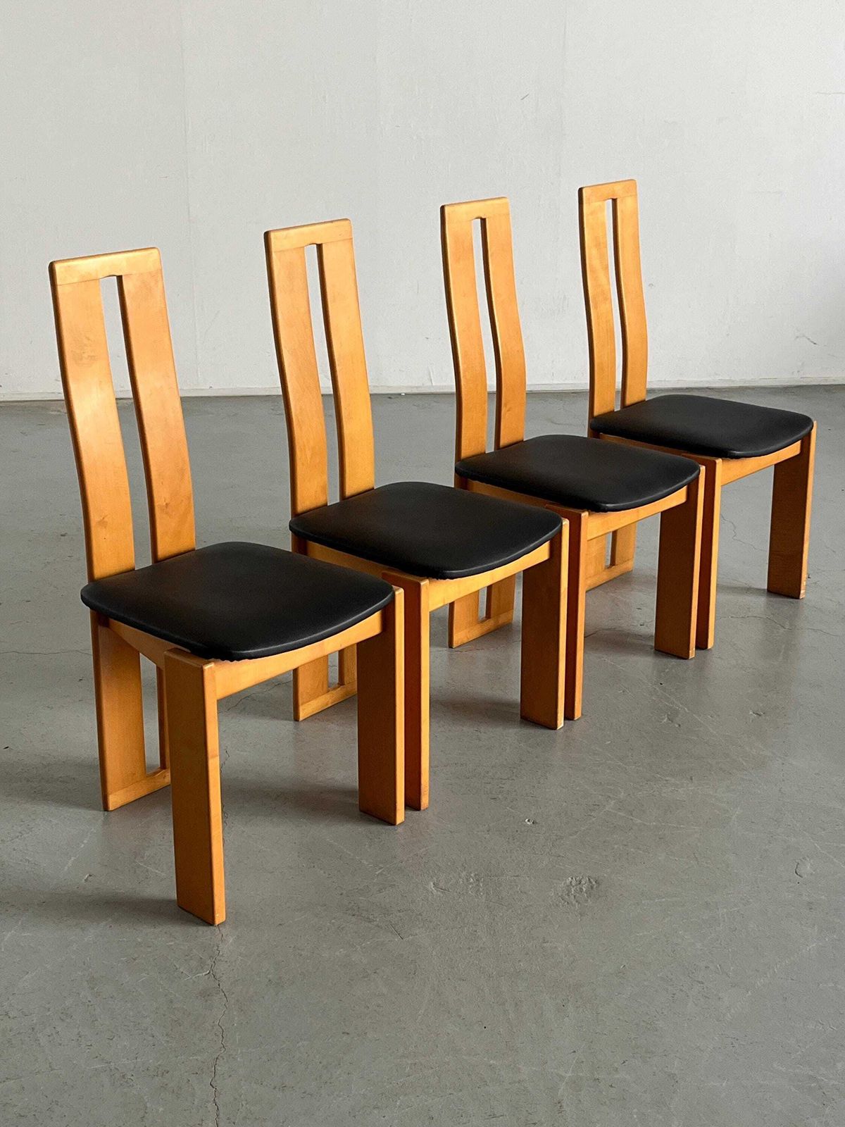 Set Of Four High Back Dining Chairs In Beechwood And Black Faux Leather In Style Of Pietro Constantini, 1970s Italy photo for sale