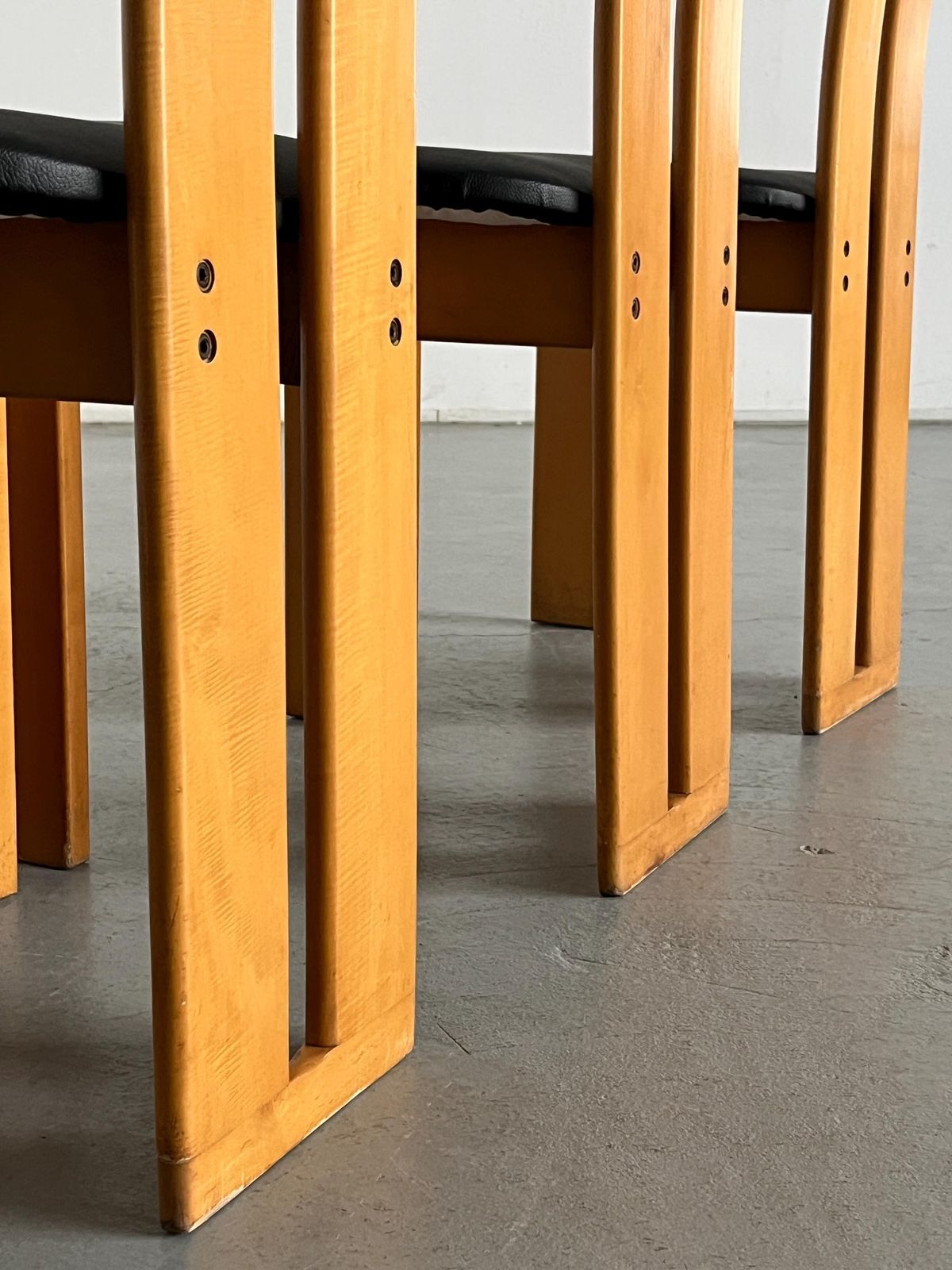 Set Of Four High Back Dining Chairs In Beechwood And Black Faux Leather In Style Of Pietro Constantini, 1970s Italy photo vintage