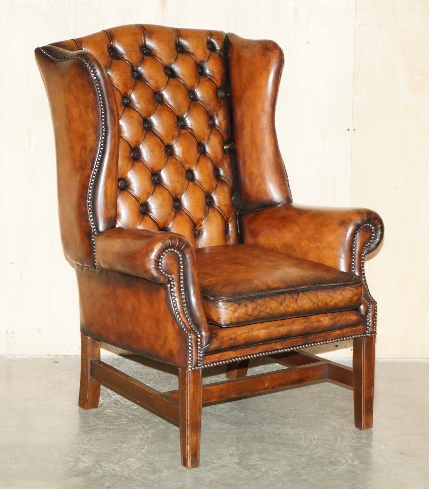 Comfortable Restored Whiskey Brown Leather Tufted Chesterfield Wingback Armchair photo furniture