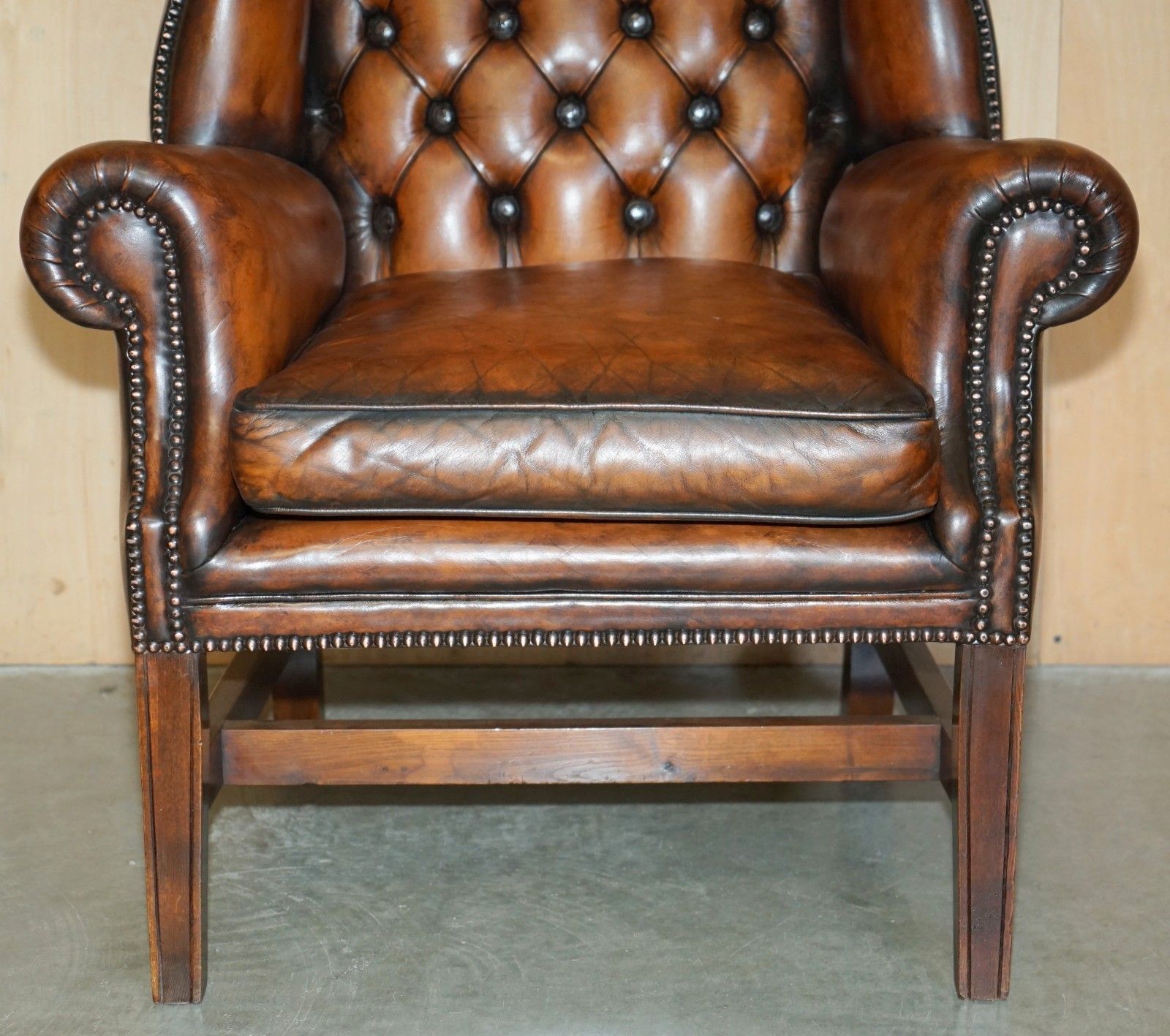photo for sale Comfortable Restored Whiskey Brown Leather Tufted Chesterfield Wingback Armchair