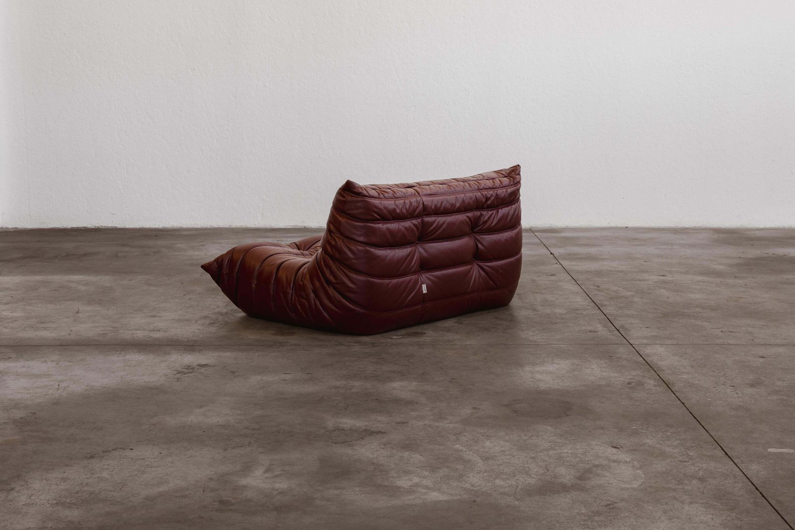 Michel Ducaroy “Togo” Two Seater Sofa For Ligne Roset, Burgundy Leather, 1973 photo vintage