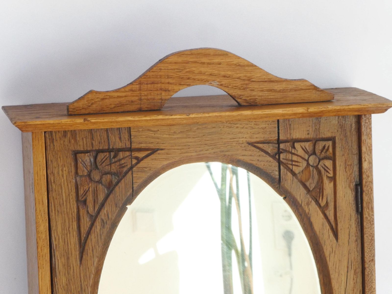 Small Antique Wooden Hanging Cabinet With Oval Mirror And Carved Floral Details, Medicine Apothecary With Drawer And Shelf photo for sale