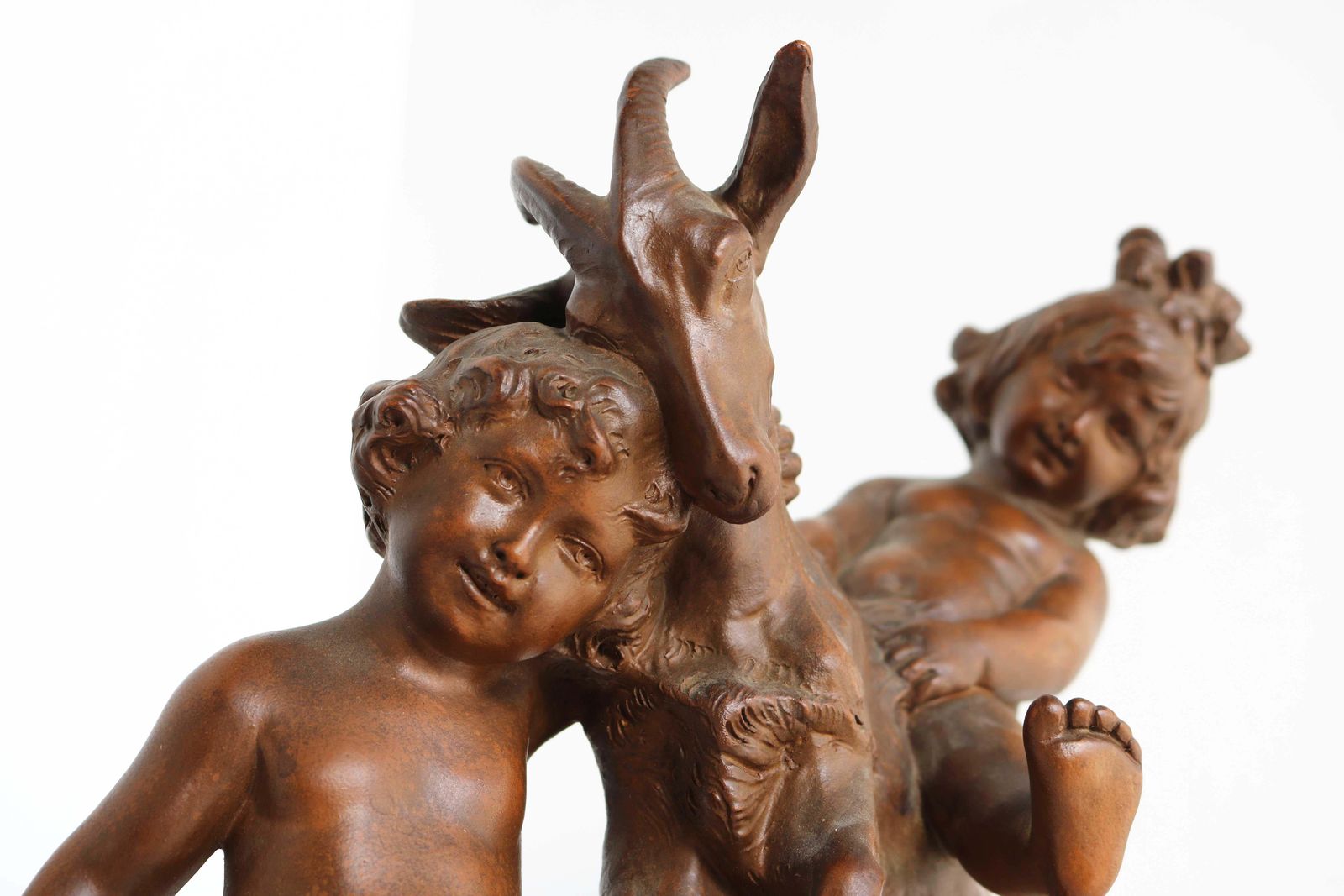 Terracotta Sculpture Boy & Girl Playing With Goat After Pietro Balestra, 1900s photo for sale