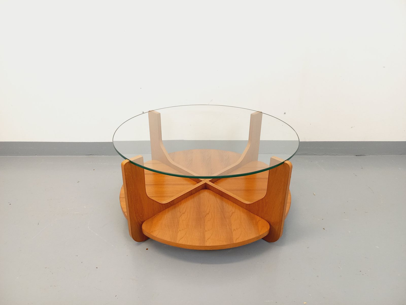 Hugues Poignant Round Coffee Table In Teak And Glass photo furniture