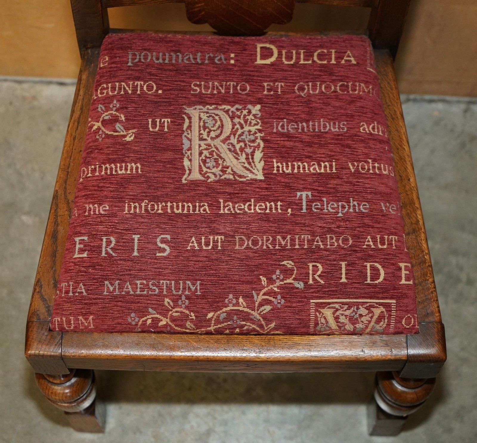photo for sale Pair Of English Oak Art Deco Hall Chairs With Latin Inscribed Seat Upholstery