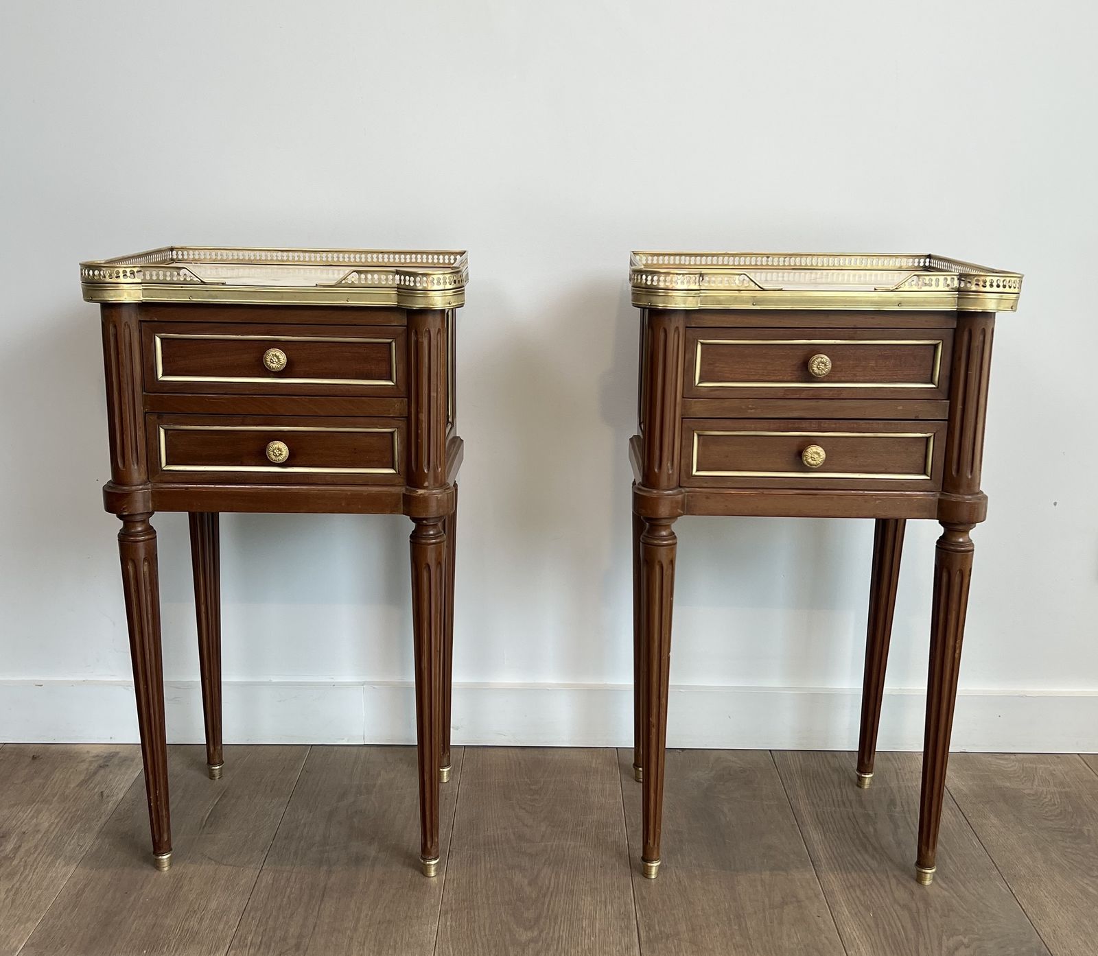 Pair Of Mahogany And Brass End Tables Or Bedside Tables With Carrara Marble Tops In The Style Of Maison Jansen. Circa 1940 photo furniture