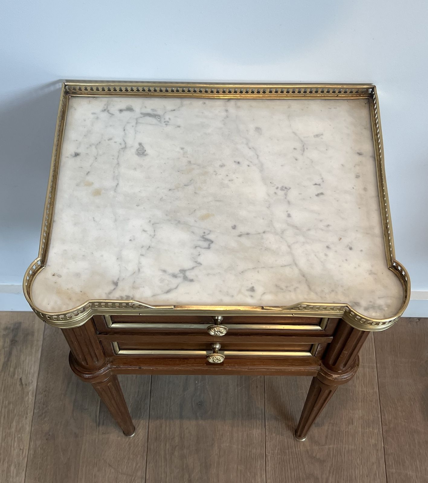 Pair Of Mahogany And Brass End Tables Or Bedside Tables With Carrara Marble Tops In The Style Of Maison Jansen. Circa 1940 photo vintage