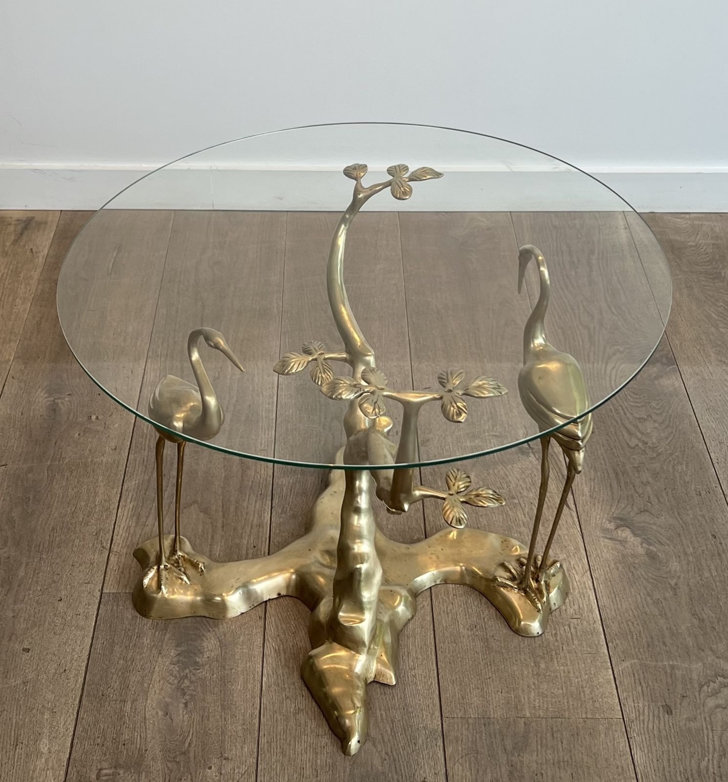 Willy Daro Brass Crane Model Coffee Table Surrounding A Bonsai Tree With Round Glass Top photo furniture