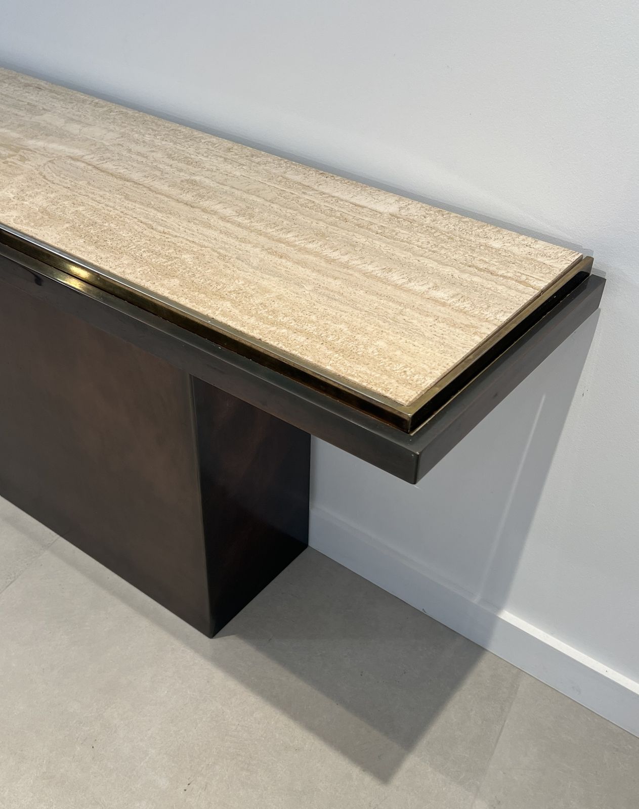 photo for sale Gunmetal Patina Console With Travertine Top. French Work. Circa 1970