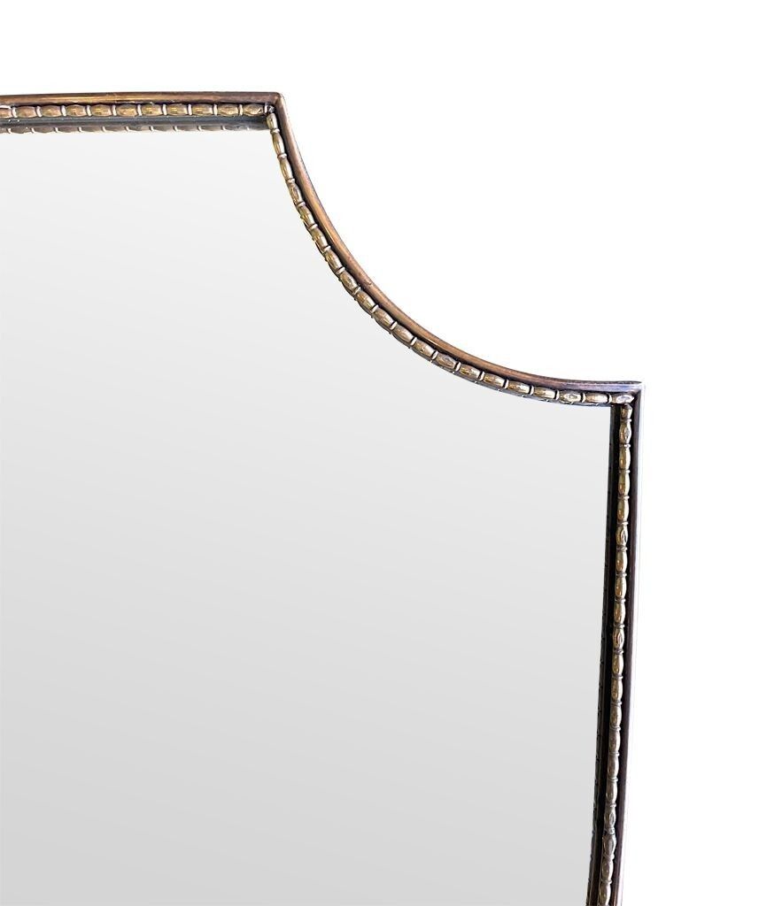 photo for sale An Orignal Italian 1960s Brass Shield Mirror With Beaded Inner Frame Detail