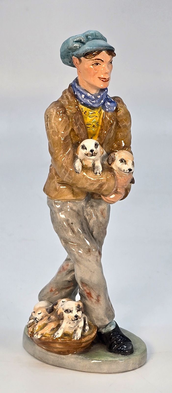 A Rare Edwardian Wedgwood & Co. Ltd China Figure Of The Puppy Seller. photo furniture