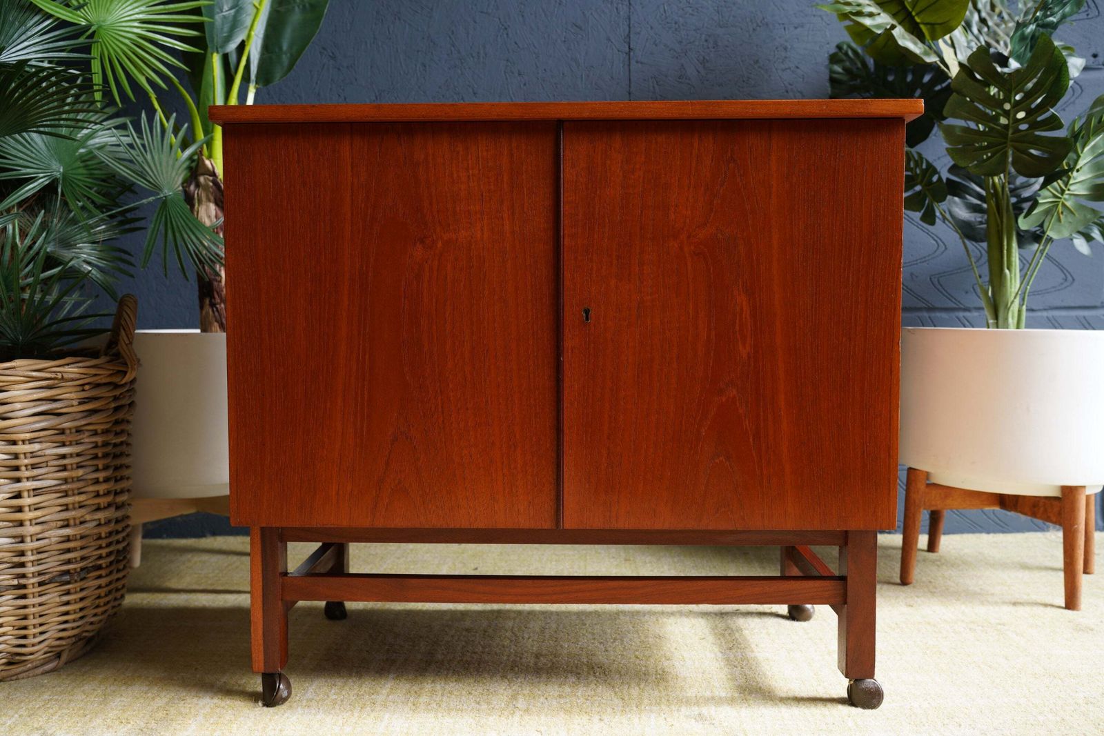 150.0 Mid Century Teak Drinks Cabinet On Castors photo