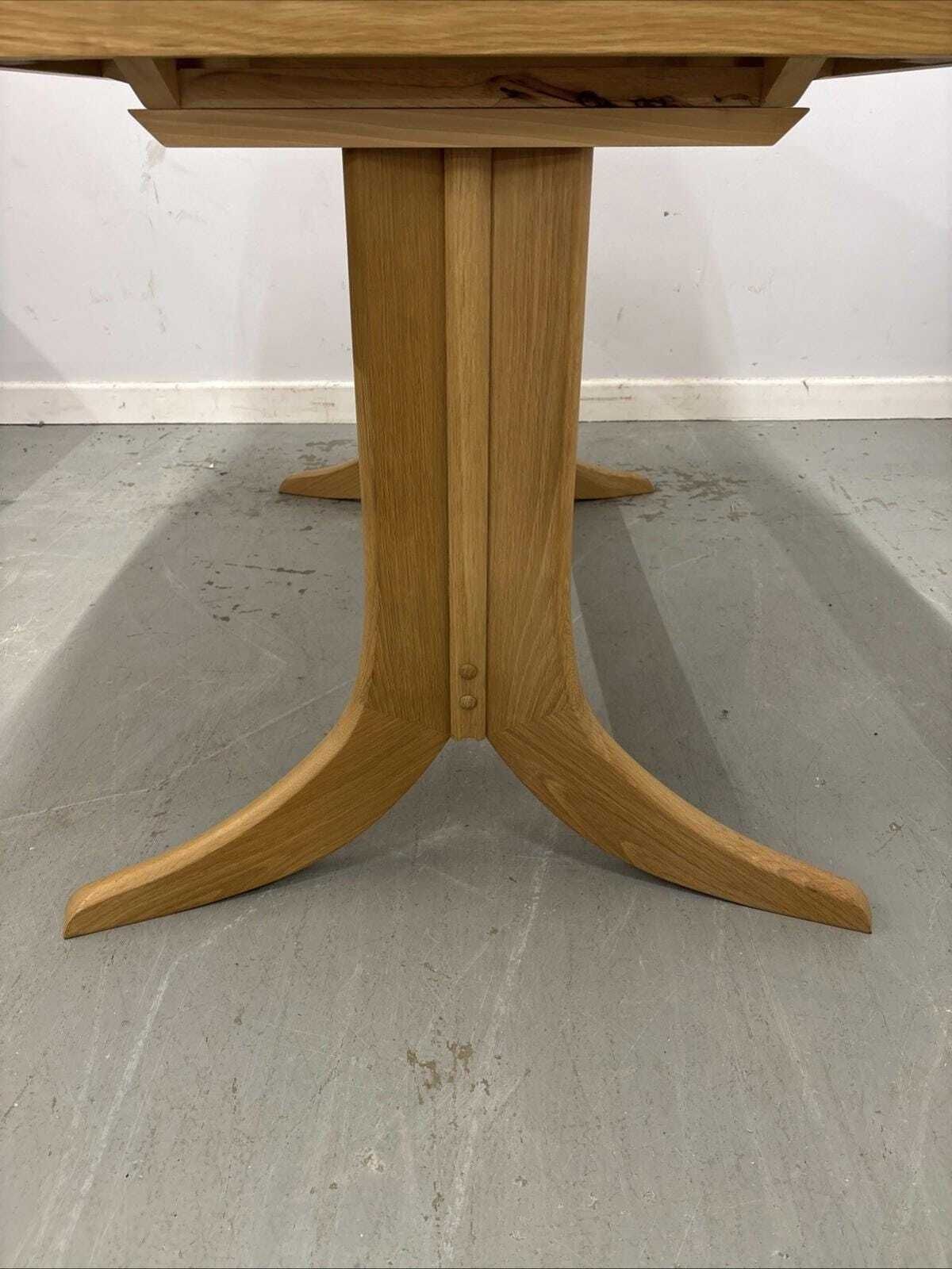 Nathan Shades Boat Shaped Extending Dining Table – Oak Finish photo vinterior